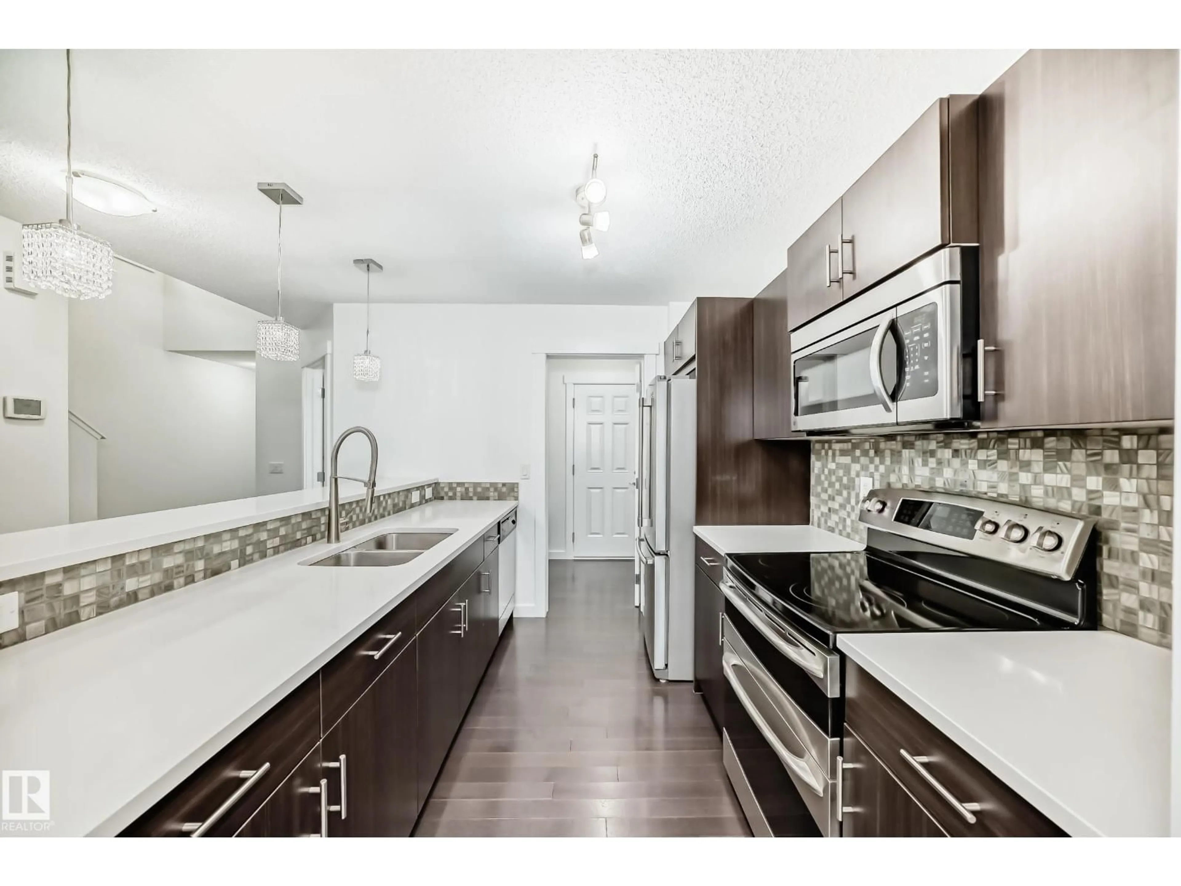 Open concept kitchen, ceramic/tile floor for 359 SIMMONDS WY, Leduc Alberta T9E0T9