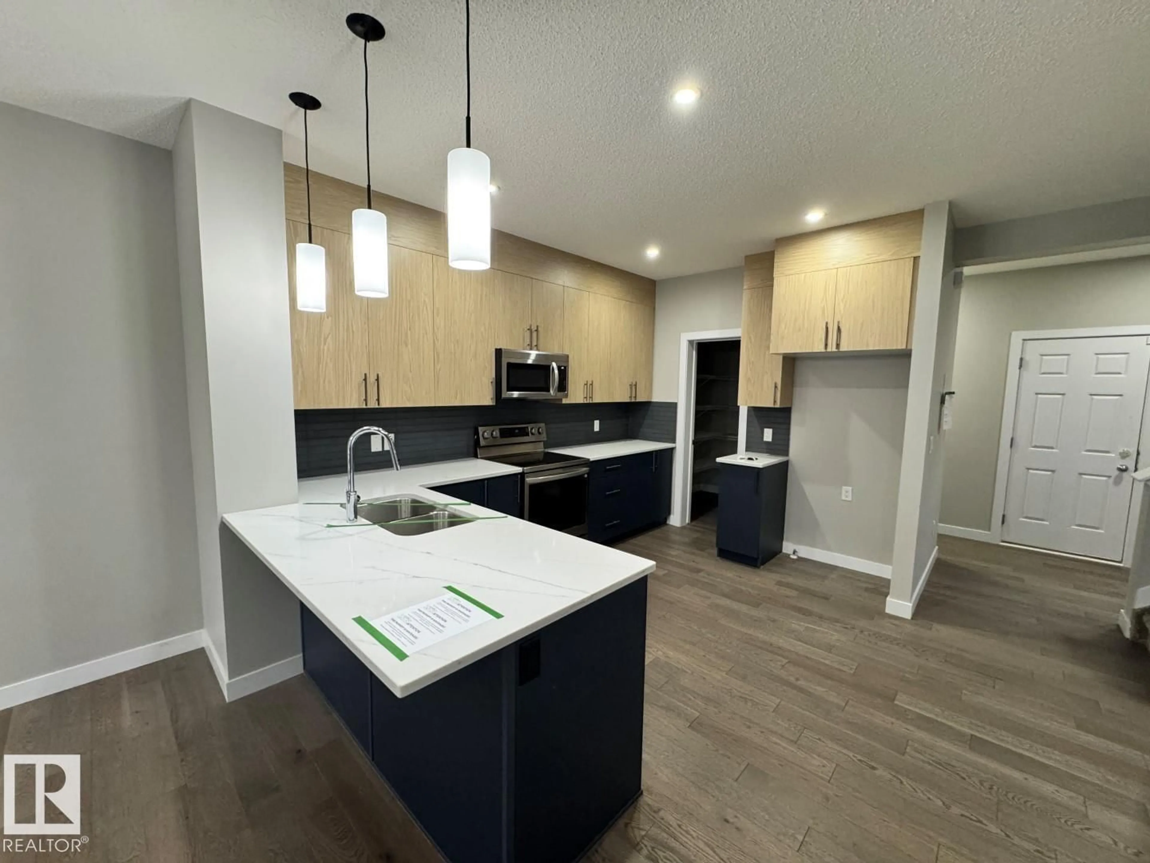 Open concept kitchen, unknown for 5130 LARK CR, Edmonton Alberta T5S0N9