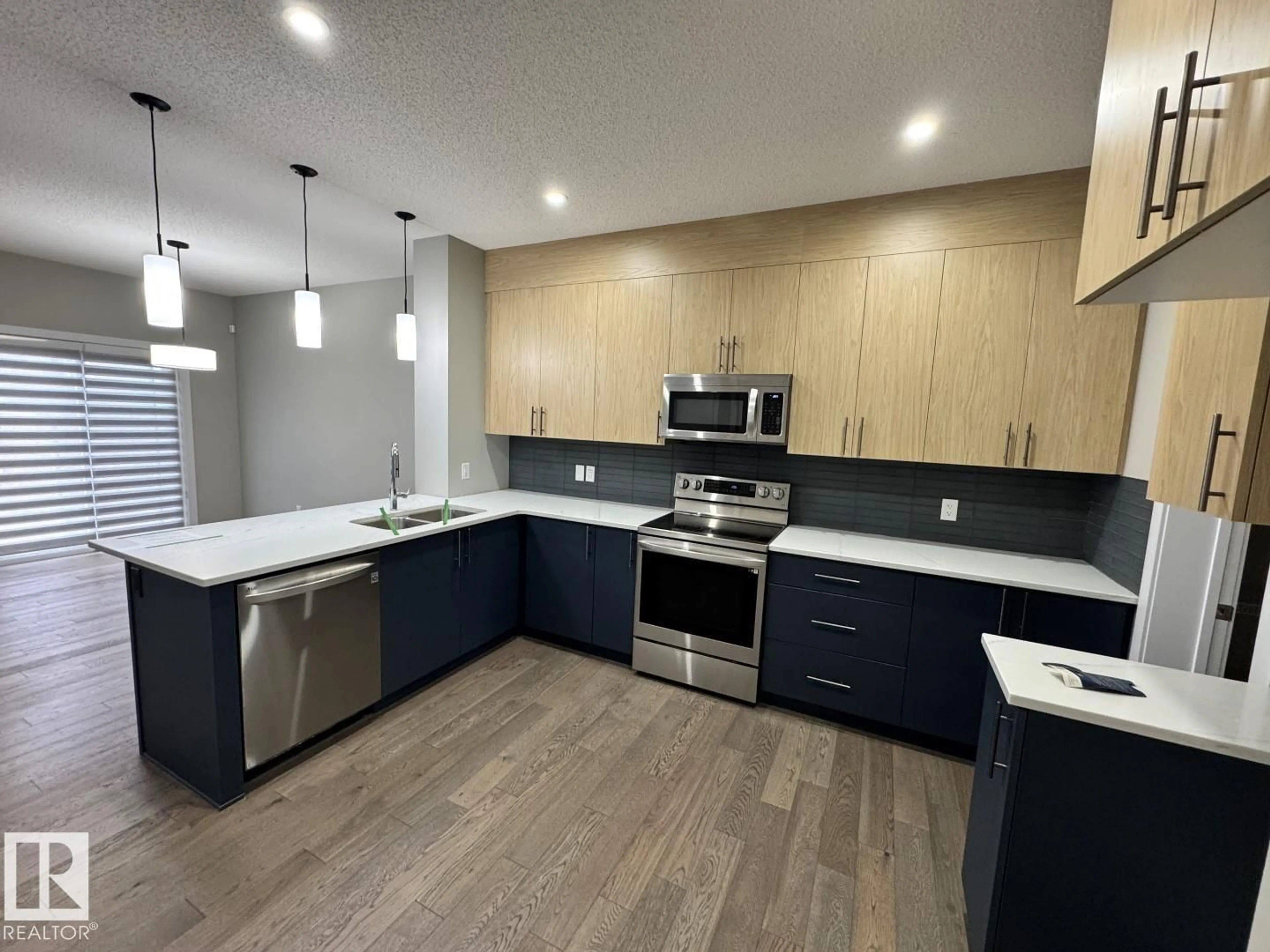 Open concept kitchen, unknown for 5130 LARK CR, Edmonton Alberta T5S0N9
