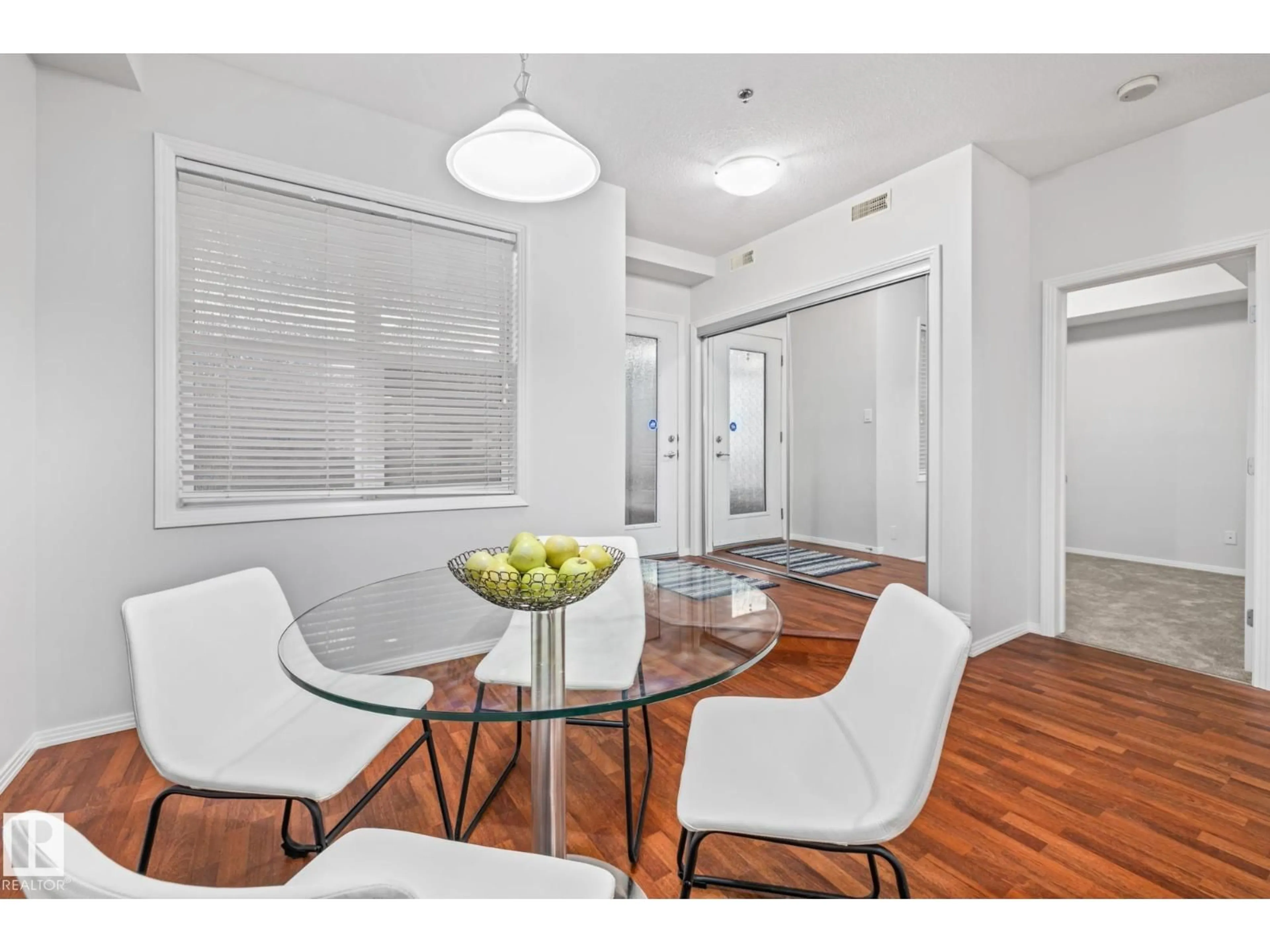 Dining room, wood/laminate floor for #127 - 4831 104A ST, Edmonton Alberta T6H0R5