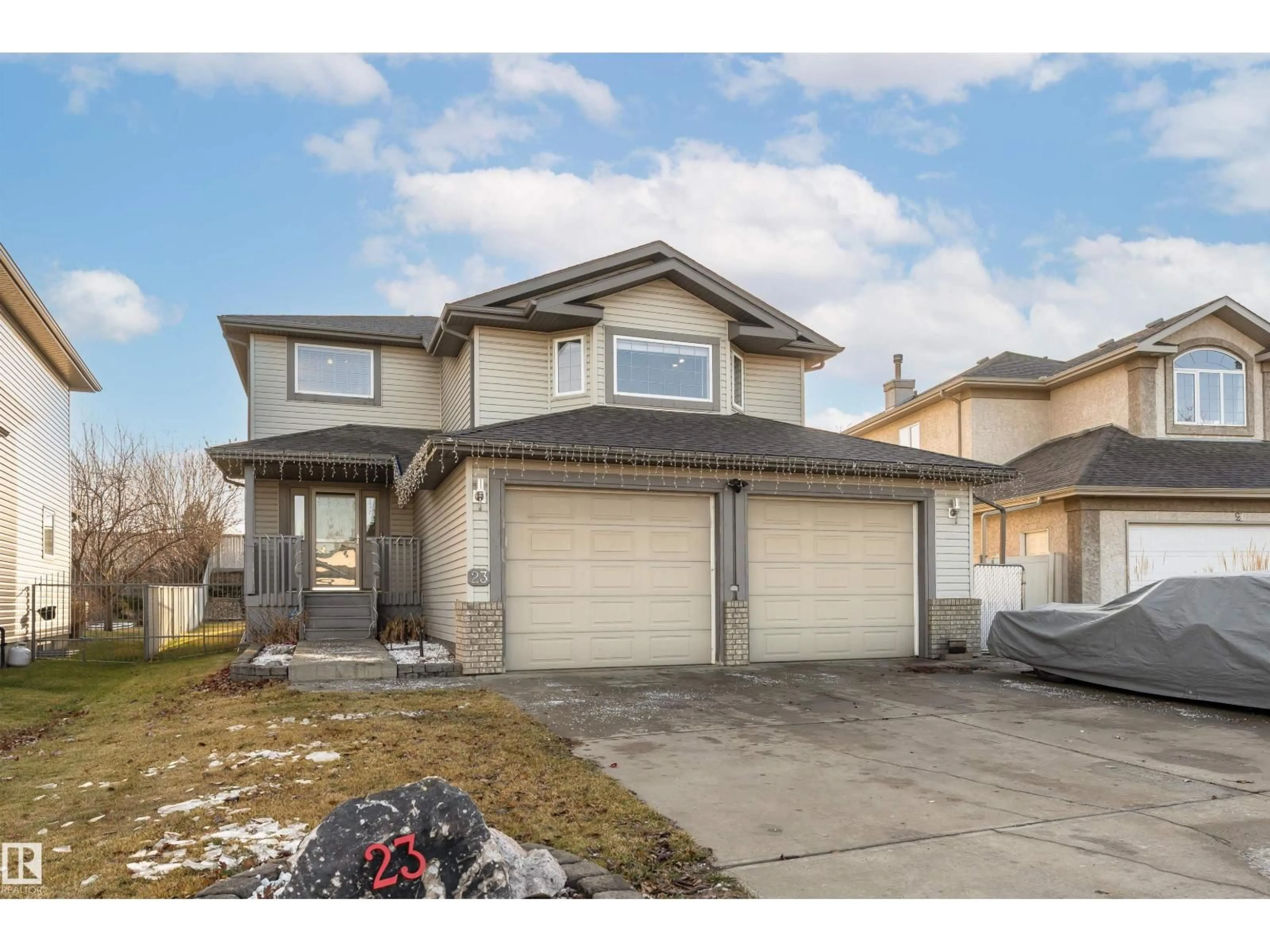 Home with vinyl exterior material, street for 23 DEER PARK CR, Spruce Grove Alberta T7X4J2