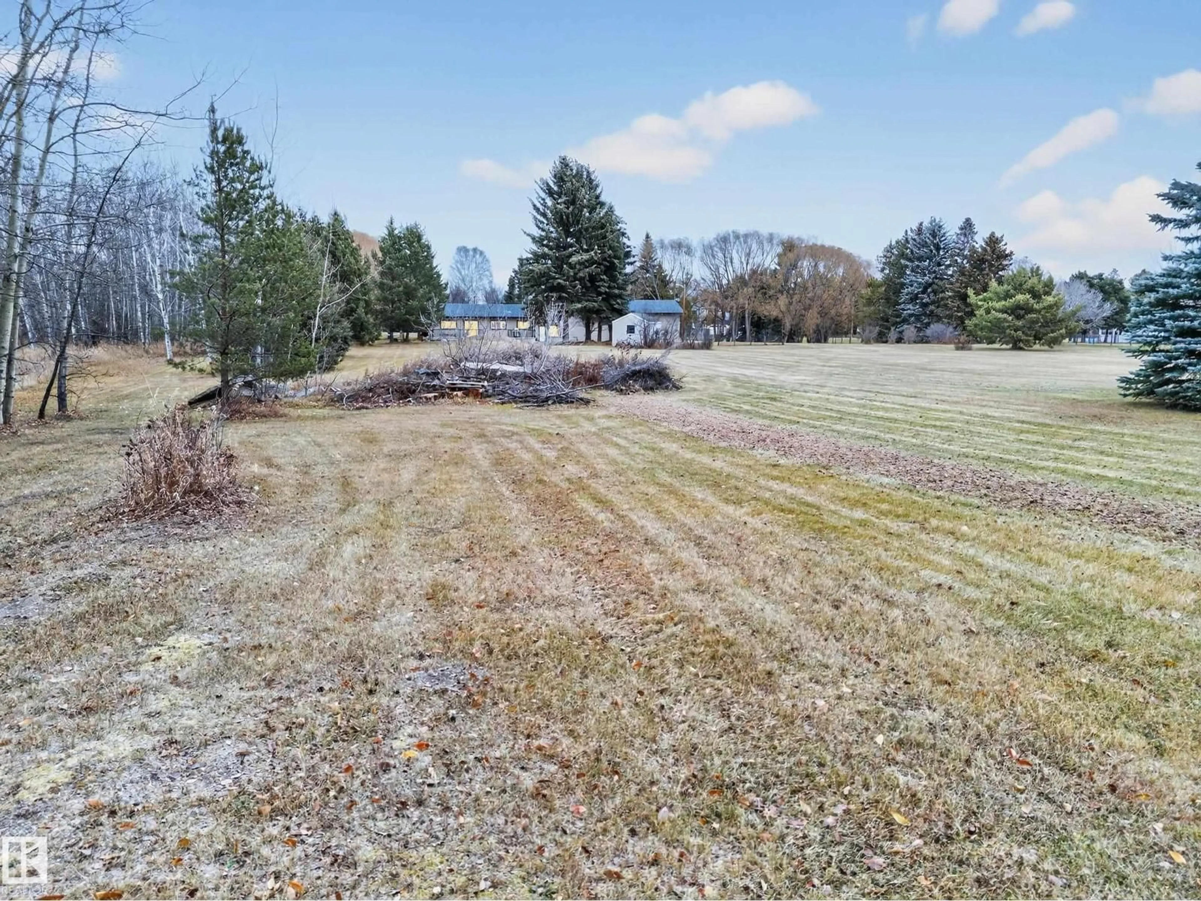 A pic from outside/outdoor area/front of a property/back of a property/a pic from drone, water/lake/river/ocean view for 37 - 51528 RGE ROAD 262, Rural Parkland County Alberta T7Y1C1