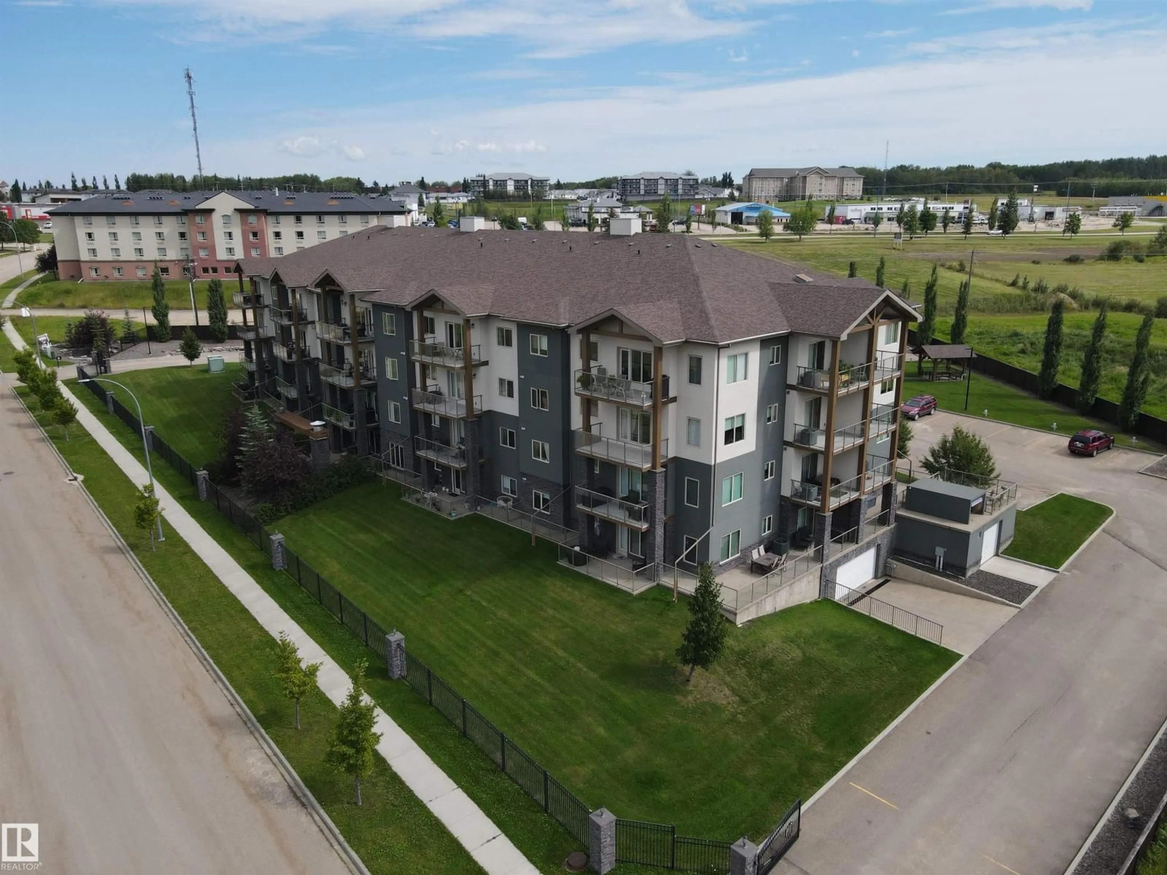 A pic from outside/outdoor area/front of a property/back of a property/a pic from drone, unknown for 407 - 5201 BROUGHAM DR, Drayton Valley Alberta T7A0A1