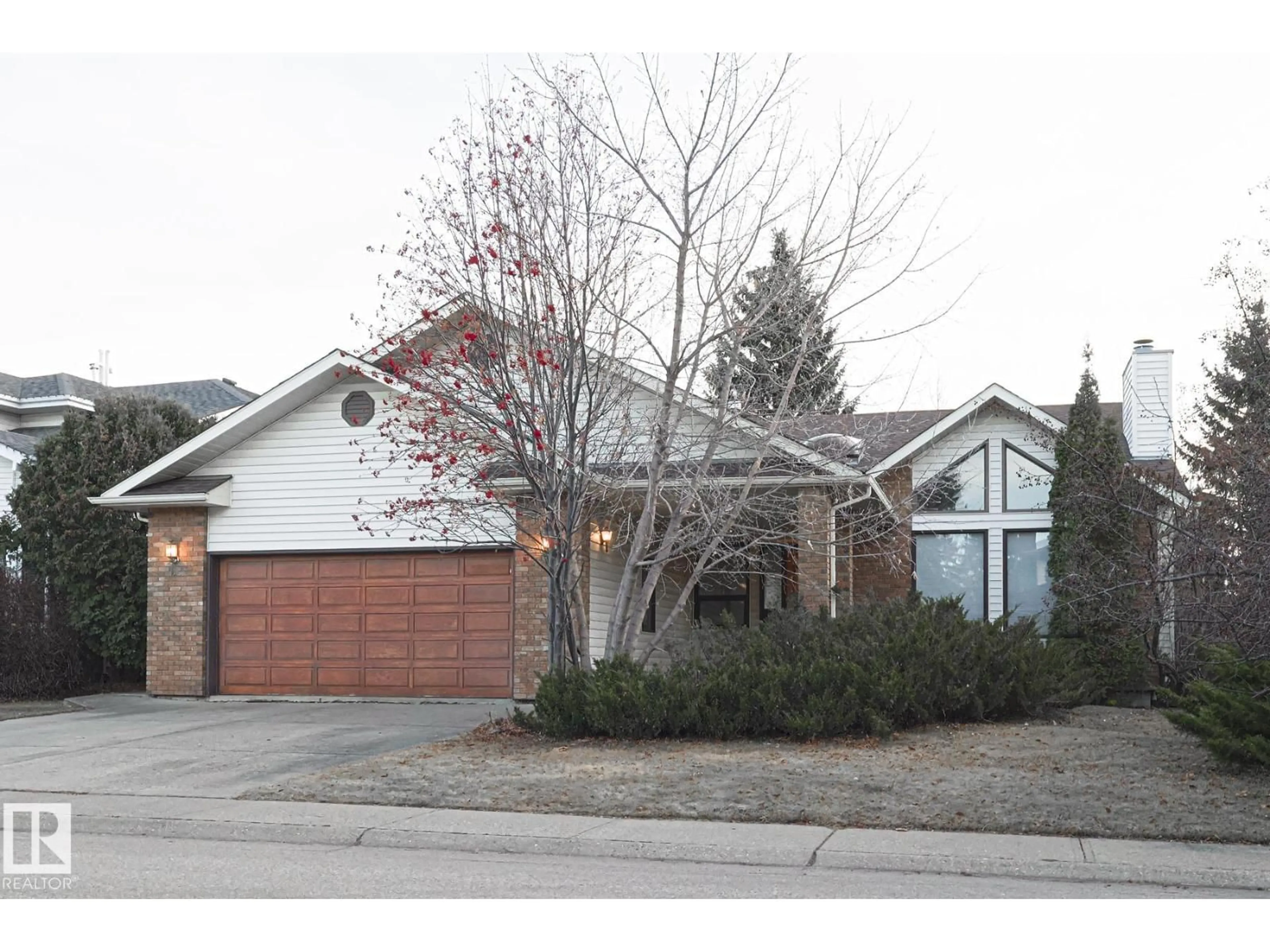 Home with brick exterior material, street for 52 BLUE QUILL CR, Edmonton Alberta T6J6C4