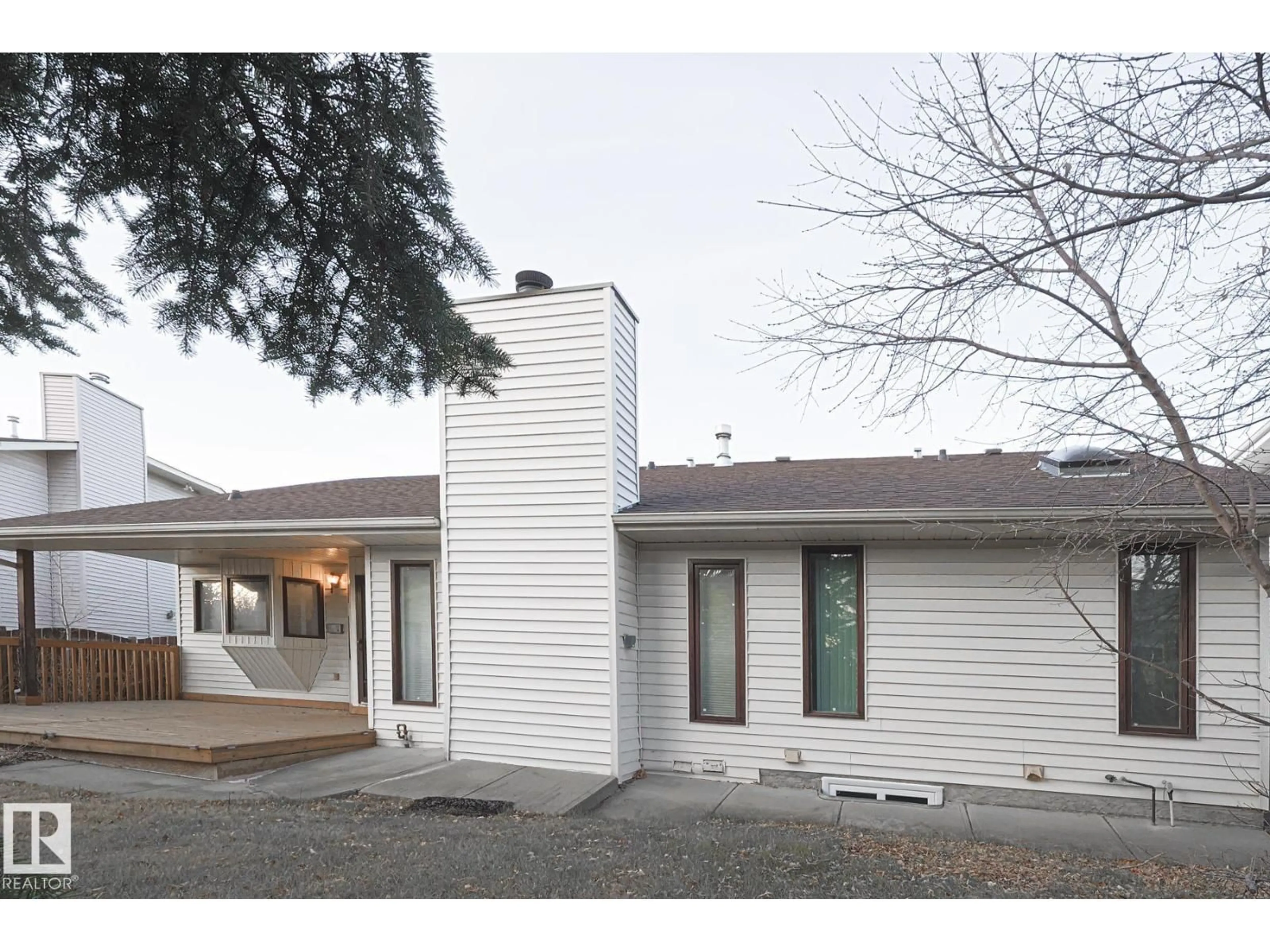 Home with vinyl exterior material, street for 52 BLUE QUILL CR, Edmonton Alberta T6J6C4