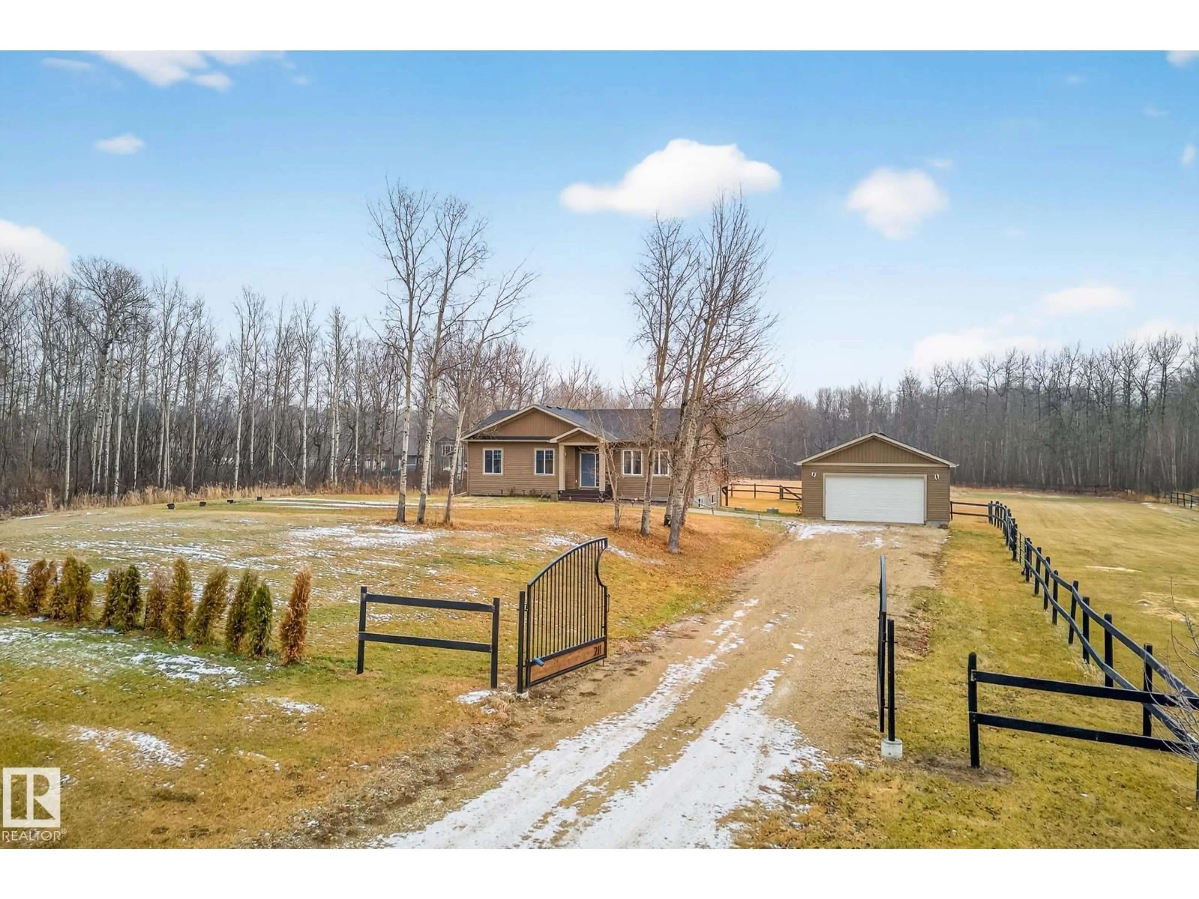 A pic from outside/outdoor area/front of a property/back of a property/a pic from drone, unknown for #211 - 55108 RGE ROAD 15, Rural Lac Ste. Anne County Alberta T0E1V0