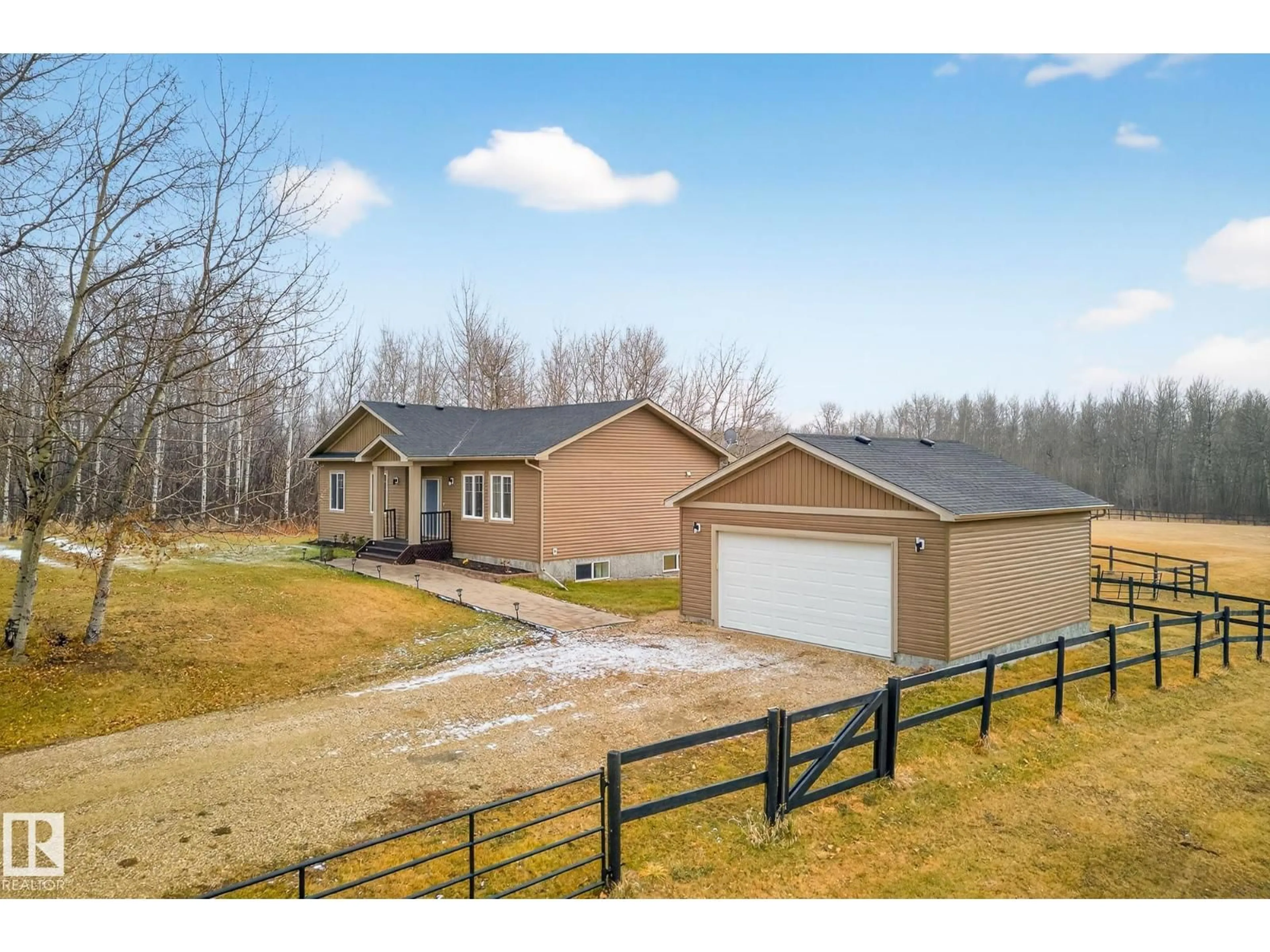 A pic from outside/outdoor area/front of a property/back of a property/a pic from drone, unknown for #211 - 55108 RGE ROAD 15, Rural Lac Ste. Anne County Alberta T0E1V0