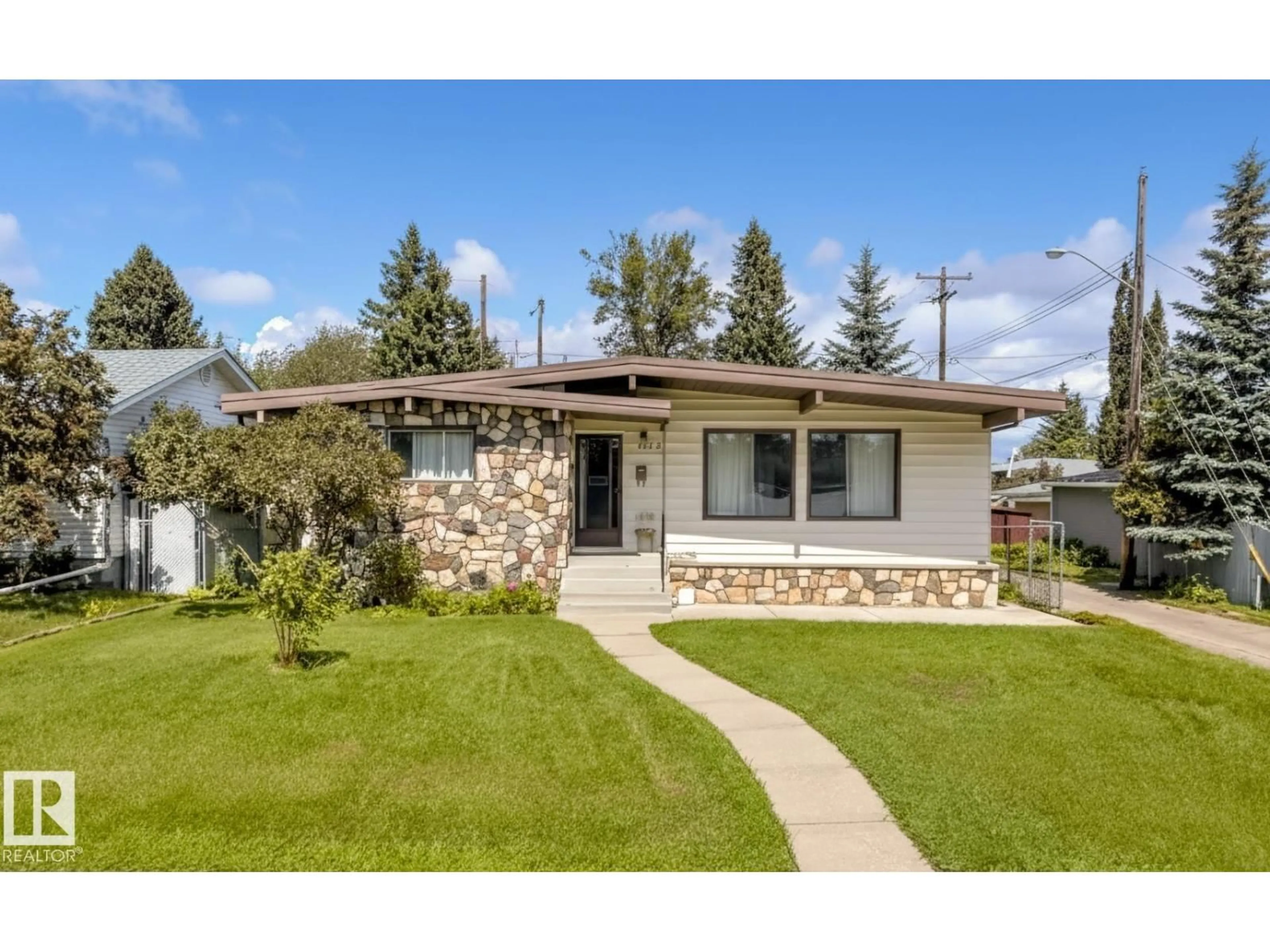 Home with vinyl exterior material, street for 11608 48 AV, Edmonton Alberta T6H0E6