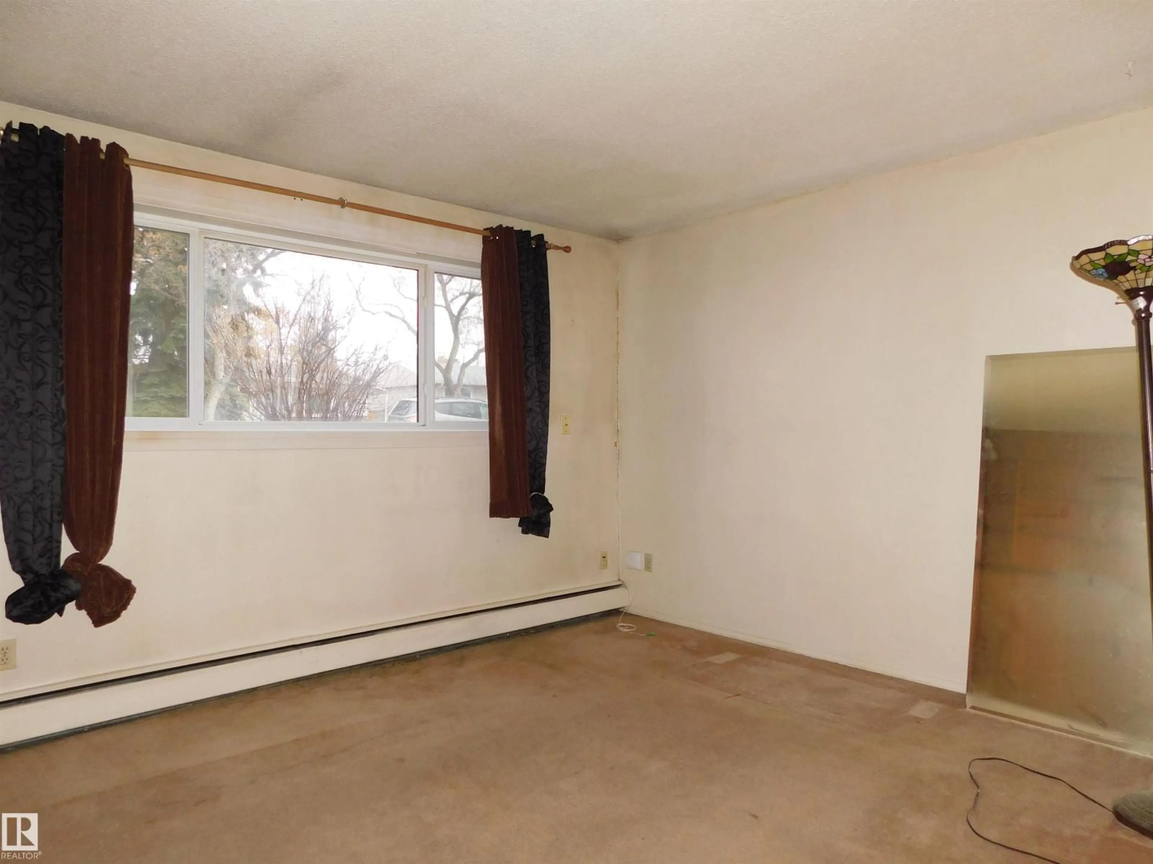 A pic of a room for #108 - 11040 129 ST, Edmonton Alberta T5M0Y3
