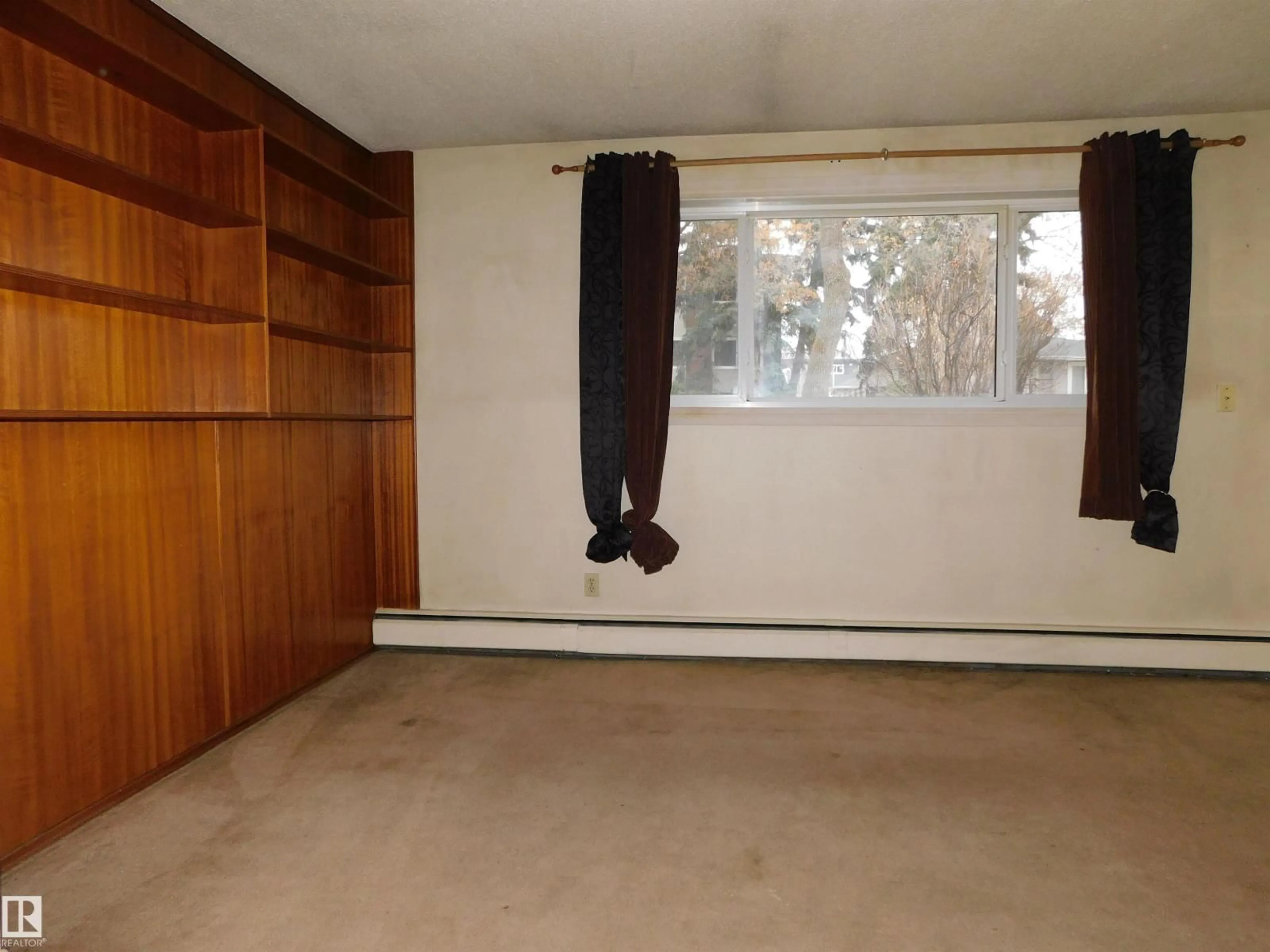 A pic of a room for #108 - 11040 129 ST, Edmonton Alberta T5M0Y3