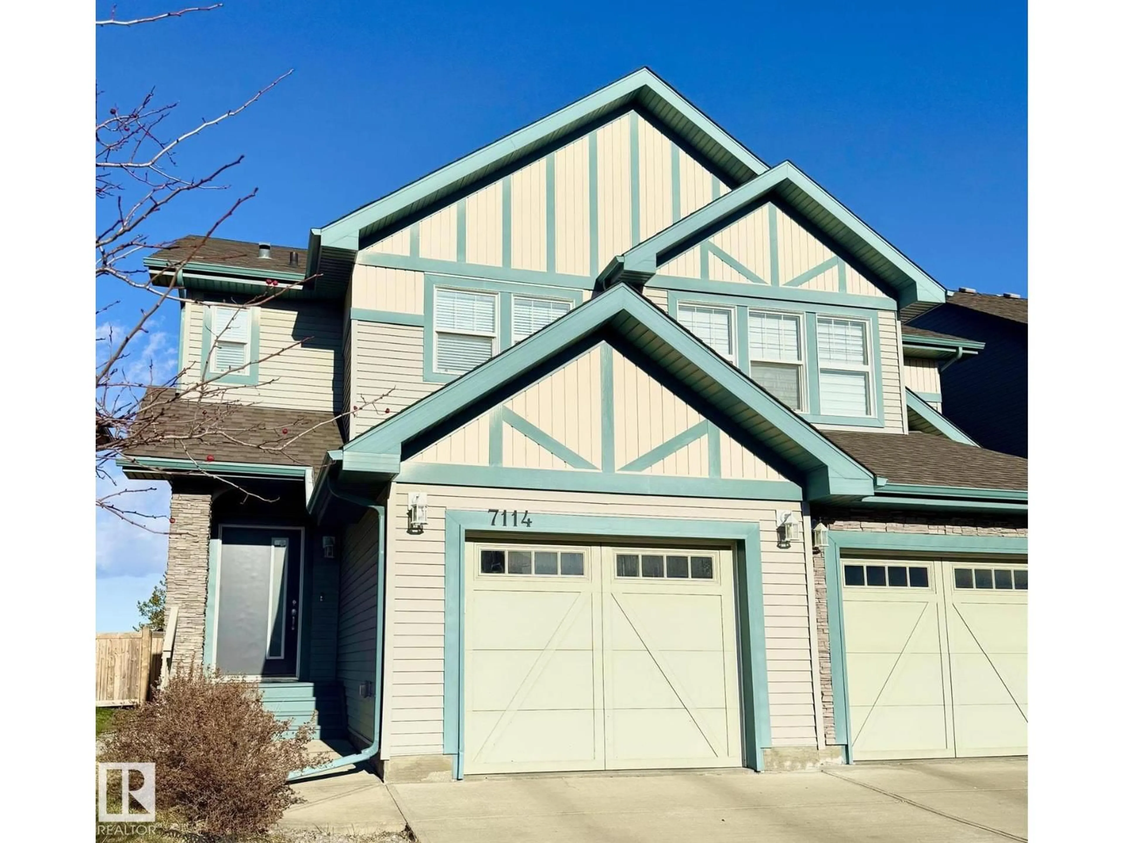 Home with vinyl exterior material, street for 7114 174 AV, Edmonton Alberta T5Z0L3