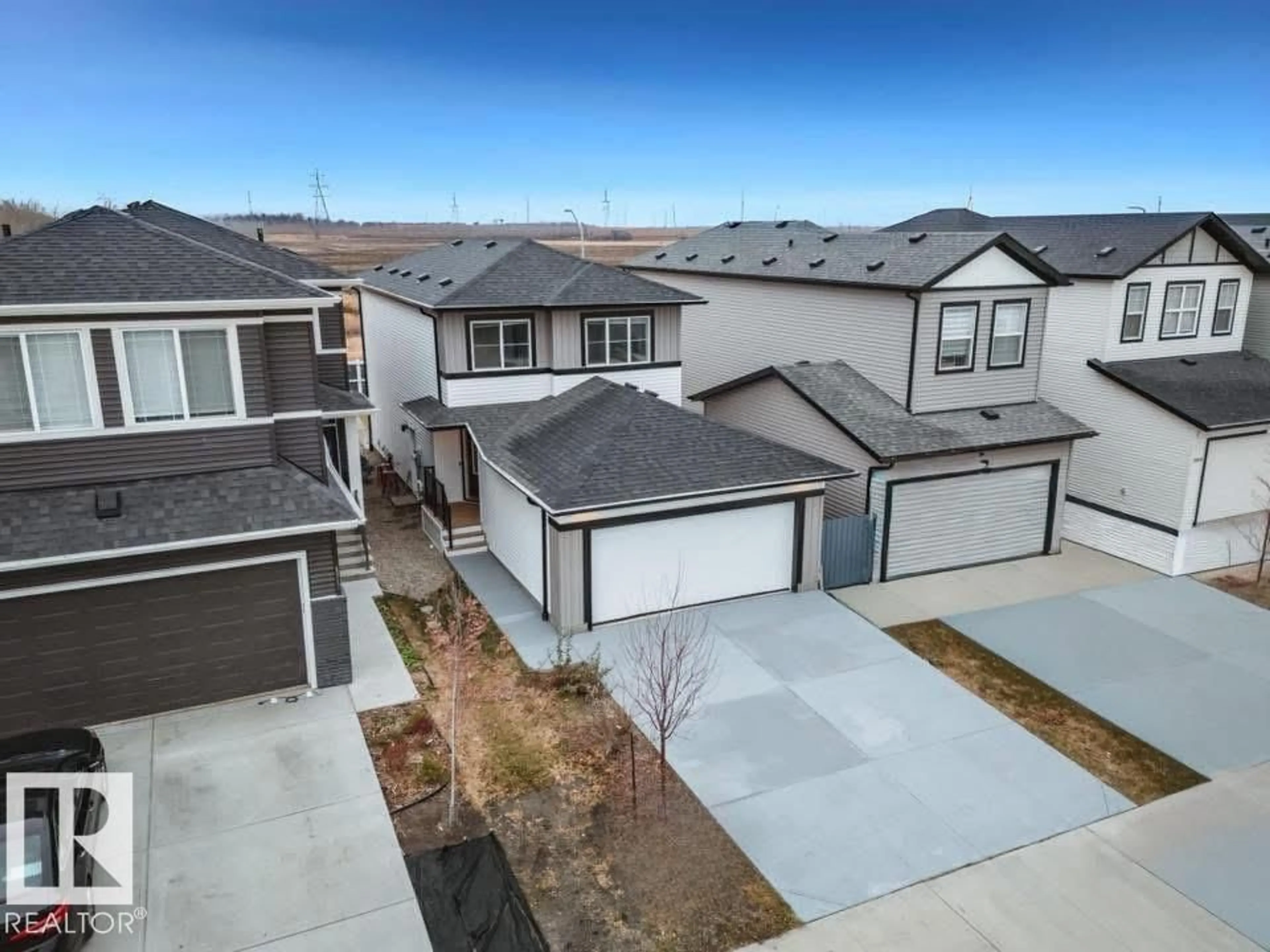 A pic from outside/outdoor area/front of a property/back of a property/a pic from drone, street for NW - 2838 152 AV, Edmonton Alberta T5Y6C4
