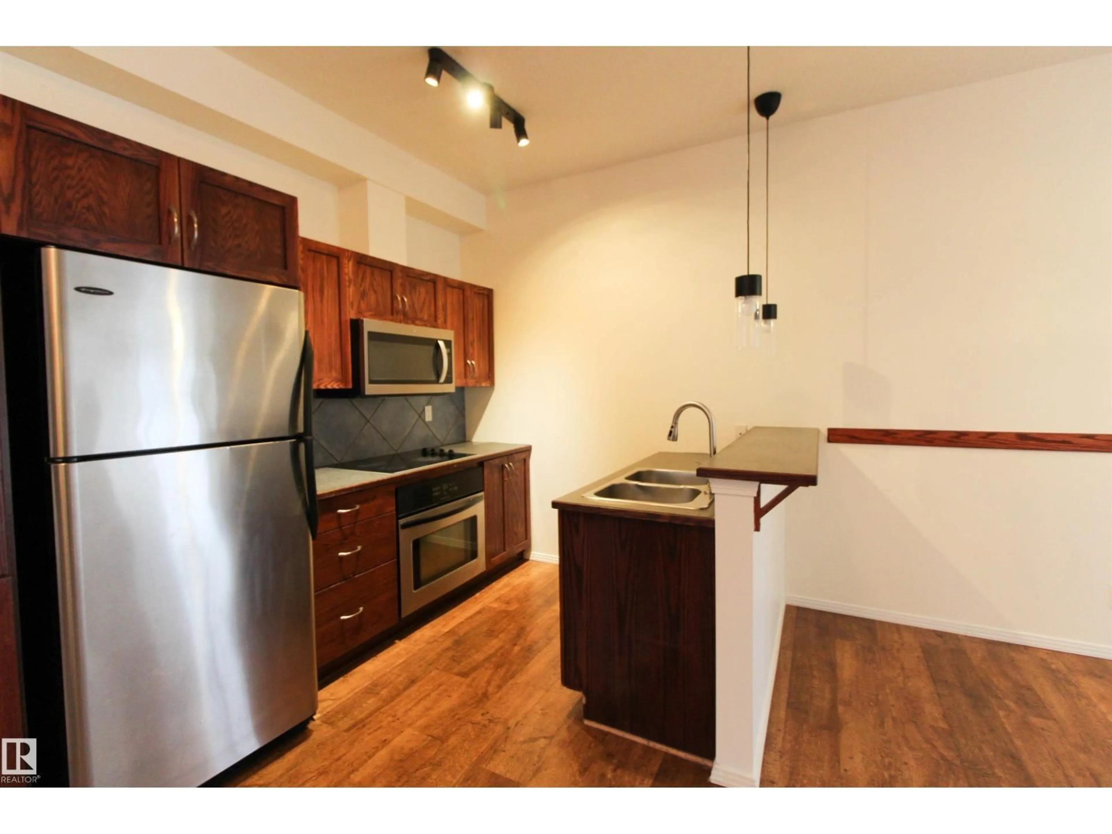 Standard kitchen, wood/laminate floor for #347 - 4827 104A ST NW, Edmonton Alberta T6H0K4