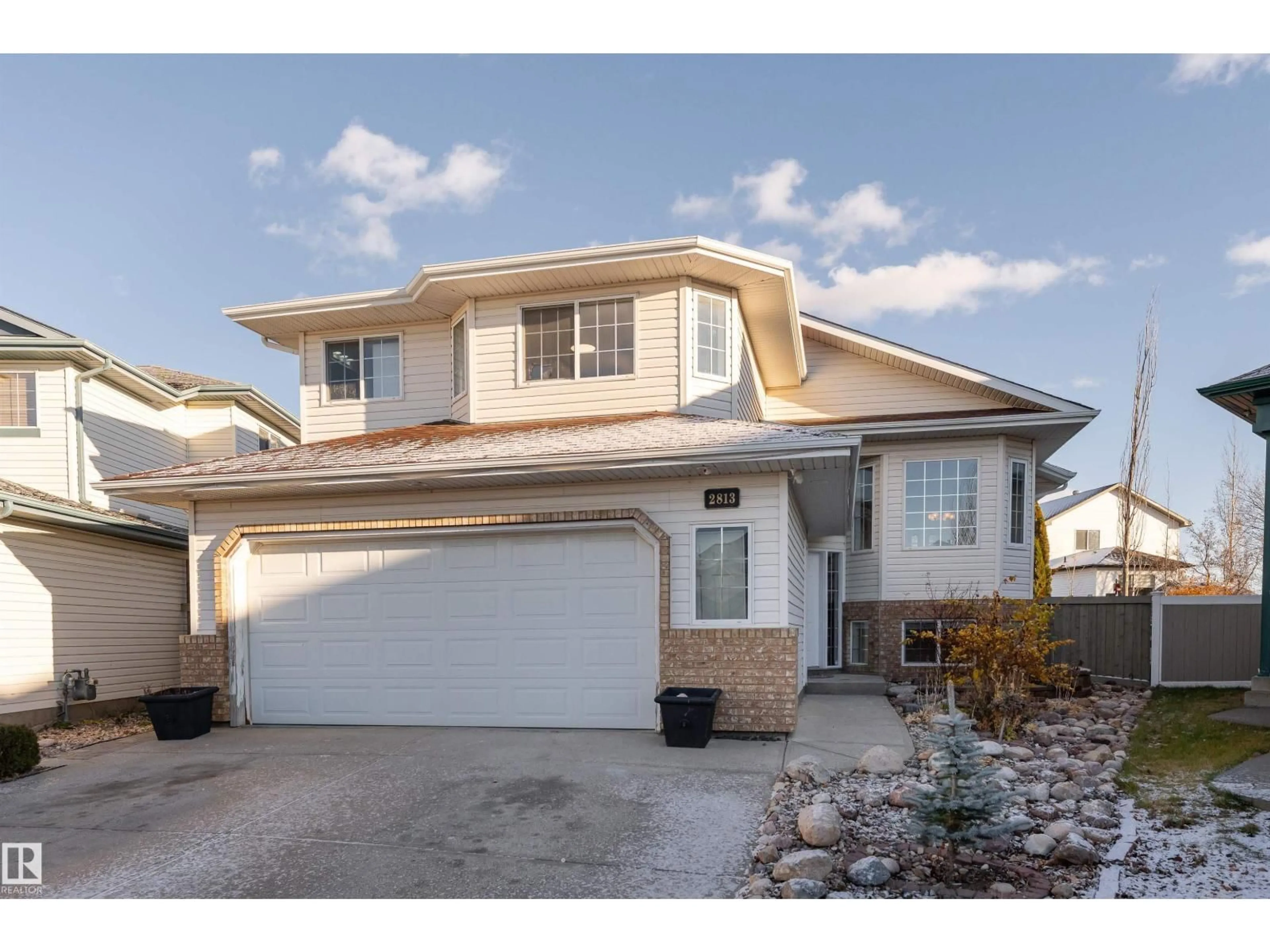 Home with vinyl exterior material, street for NW - 2813 32A ST, Edmonton Alberta T6T0M5