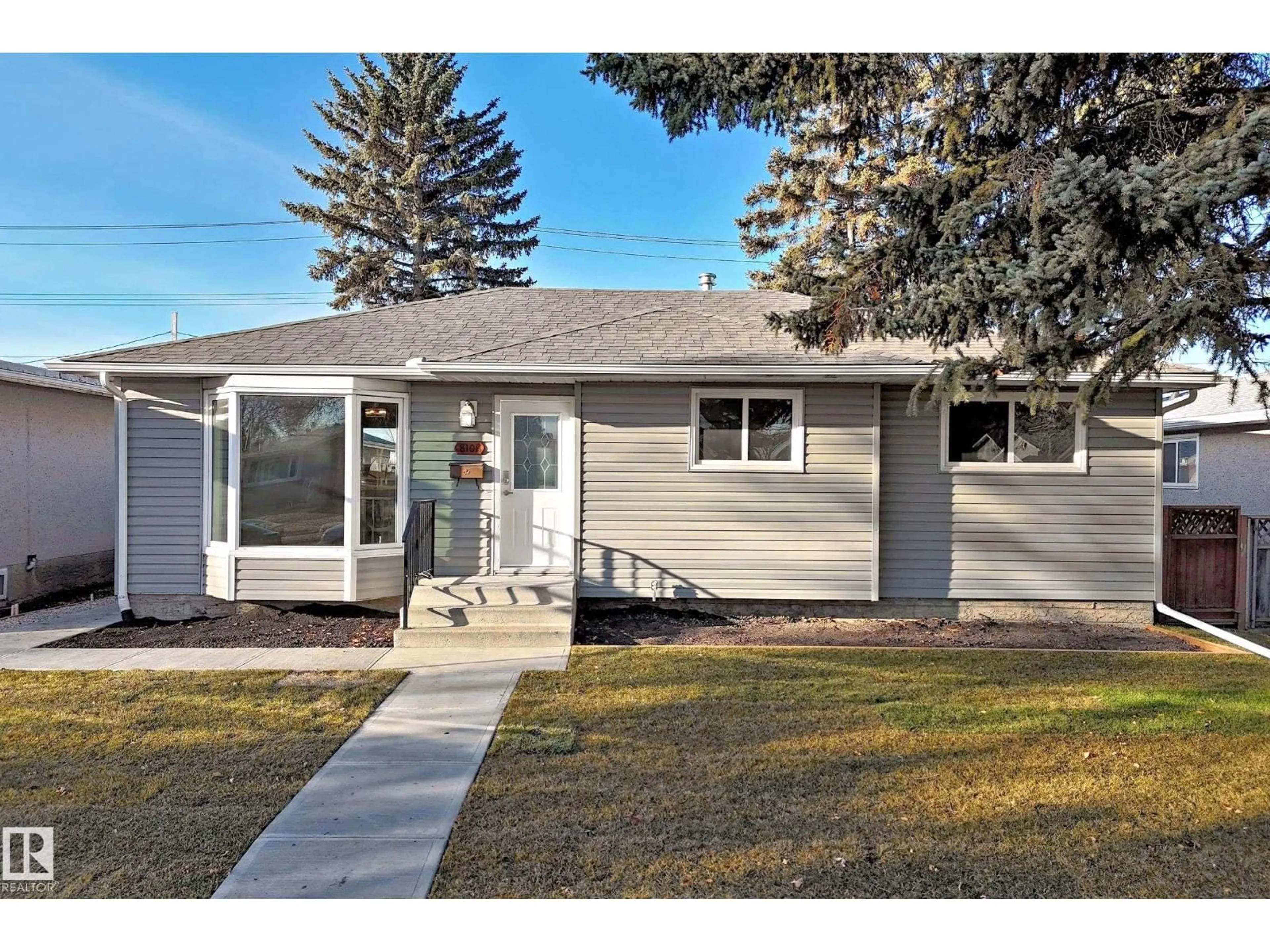 Home with vinyl exterior material, street for 8108 163 ST, Edmonton Alberta T5R2N3