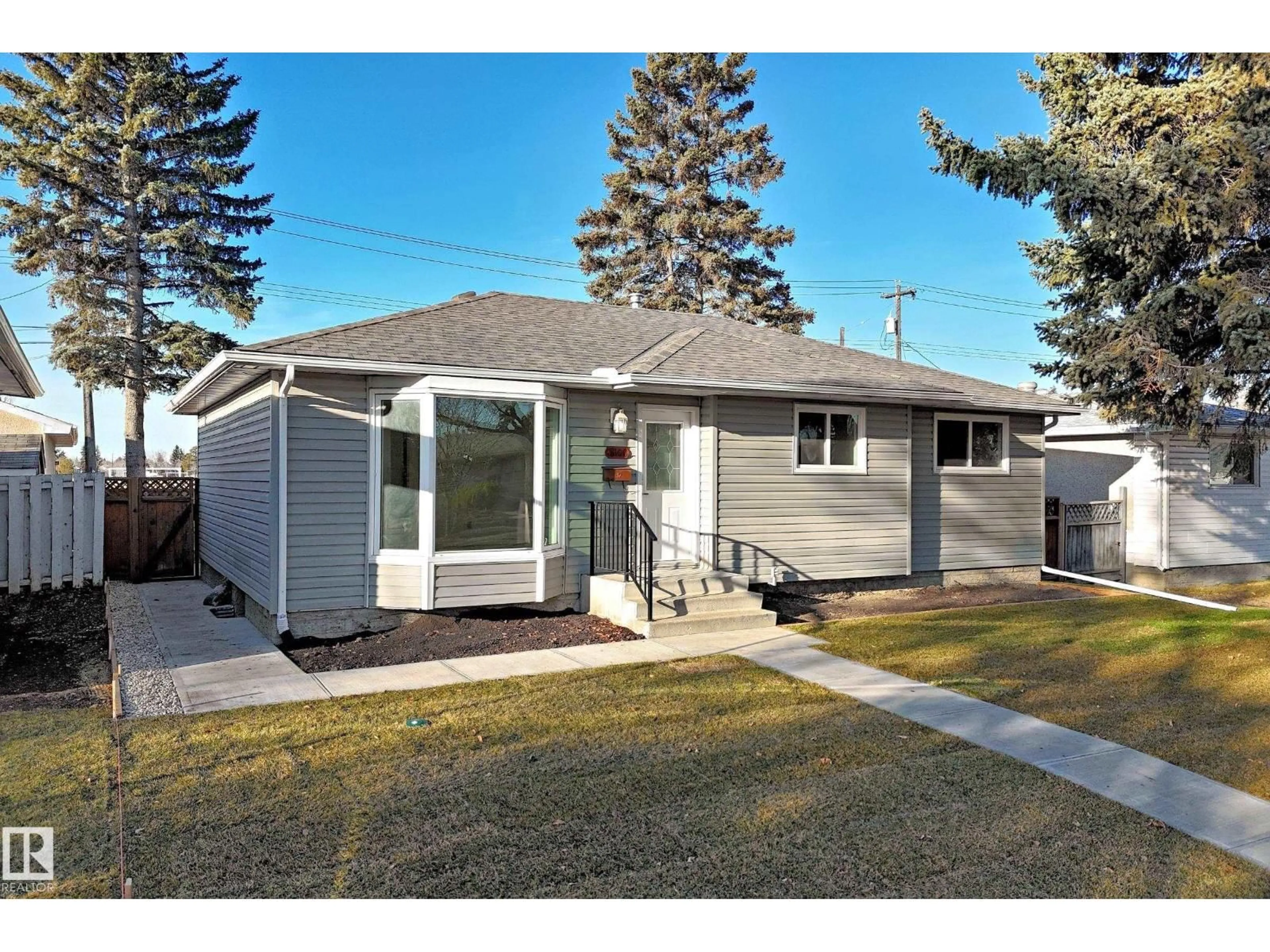 Home with vinyl exterior material, street for 8108 163 ST, Edmonton Alberta T5R2N3