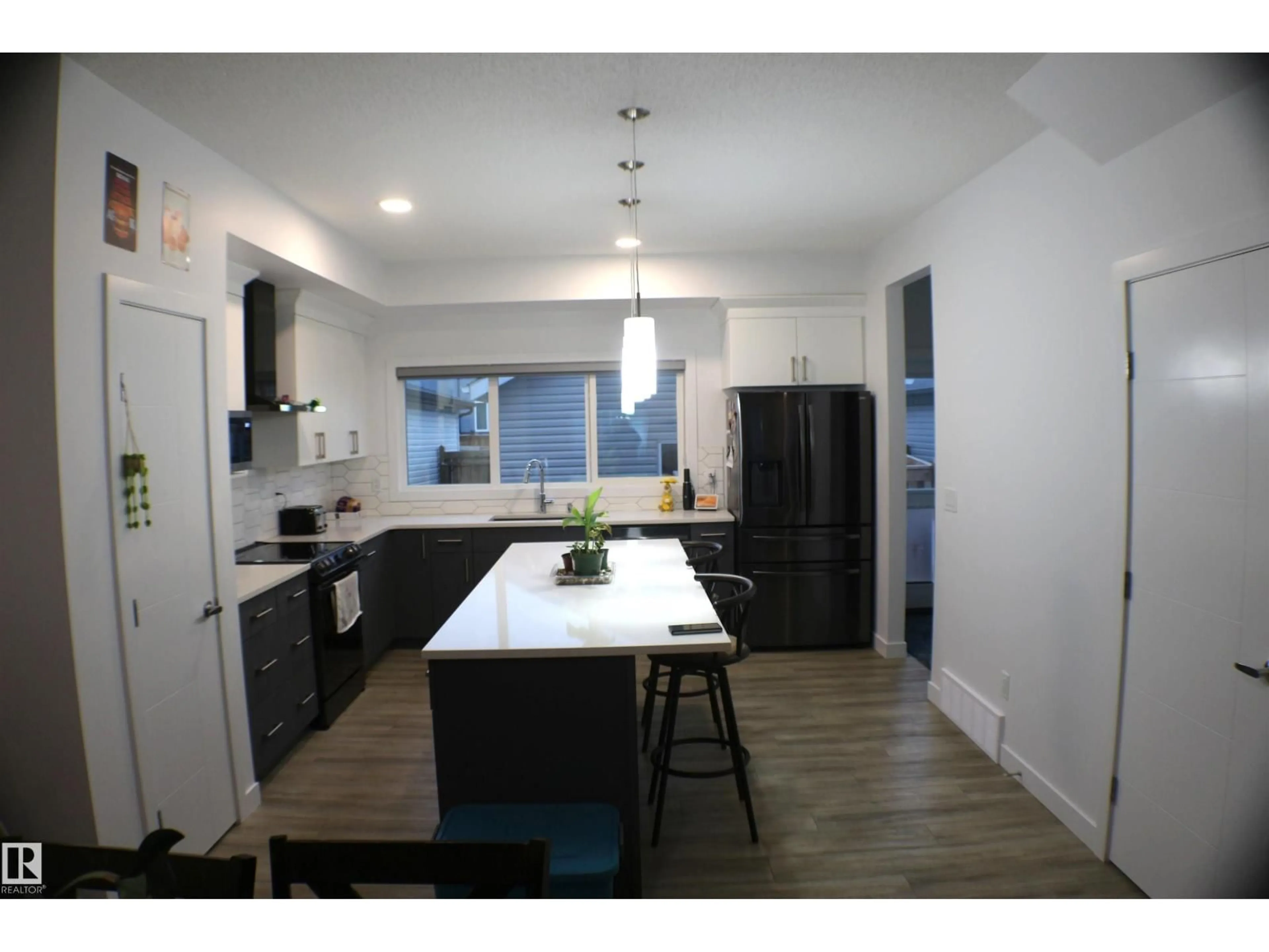 Open concept kitchen, unknown for 621 BLACK STONE BV, Leduc Alberta T9E1M3