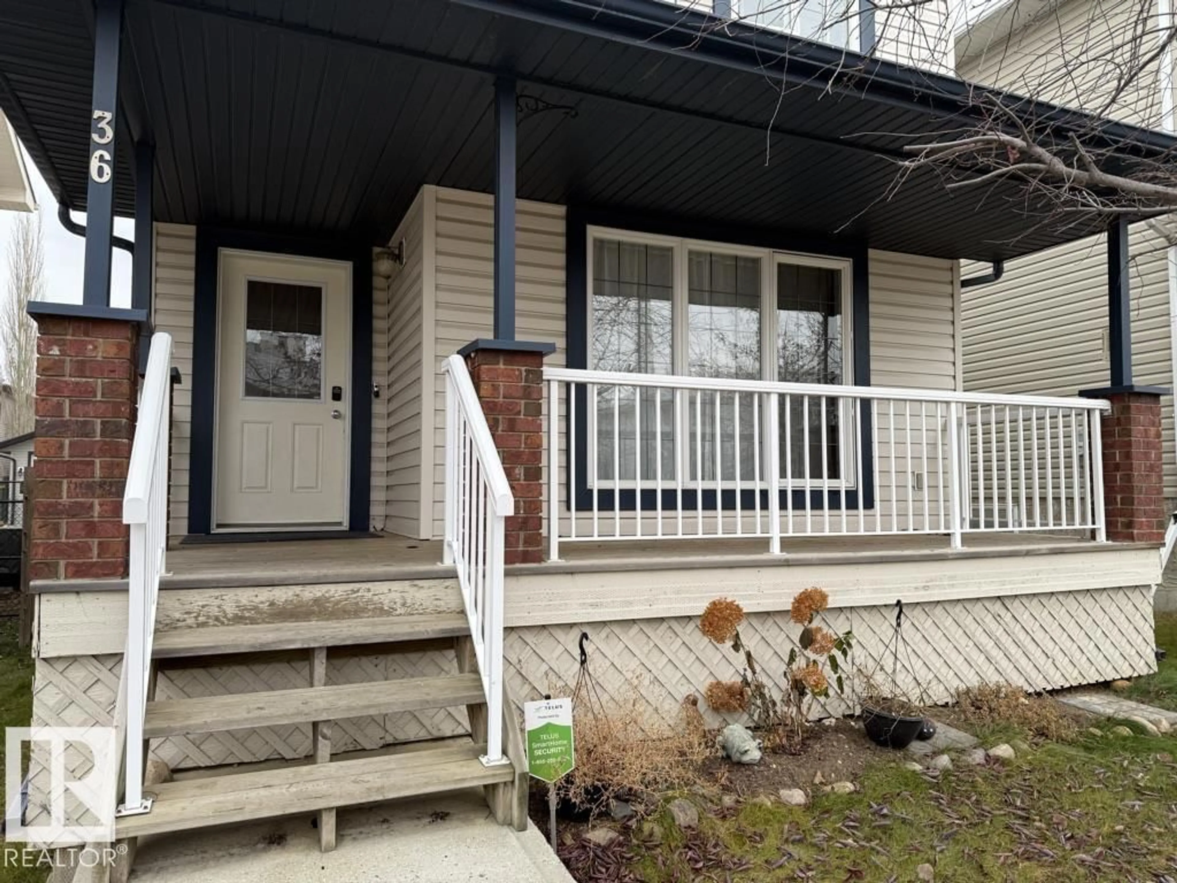 Home with vinyl exterior material, street for 36 VIVIAN WAY, Spruce Grove Alberta T7X0C2