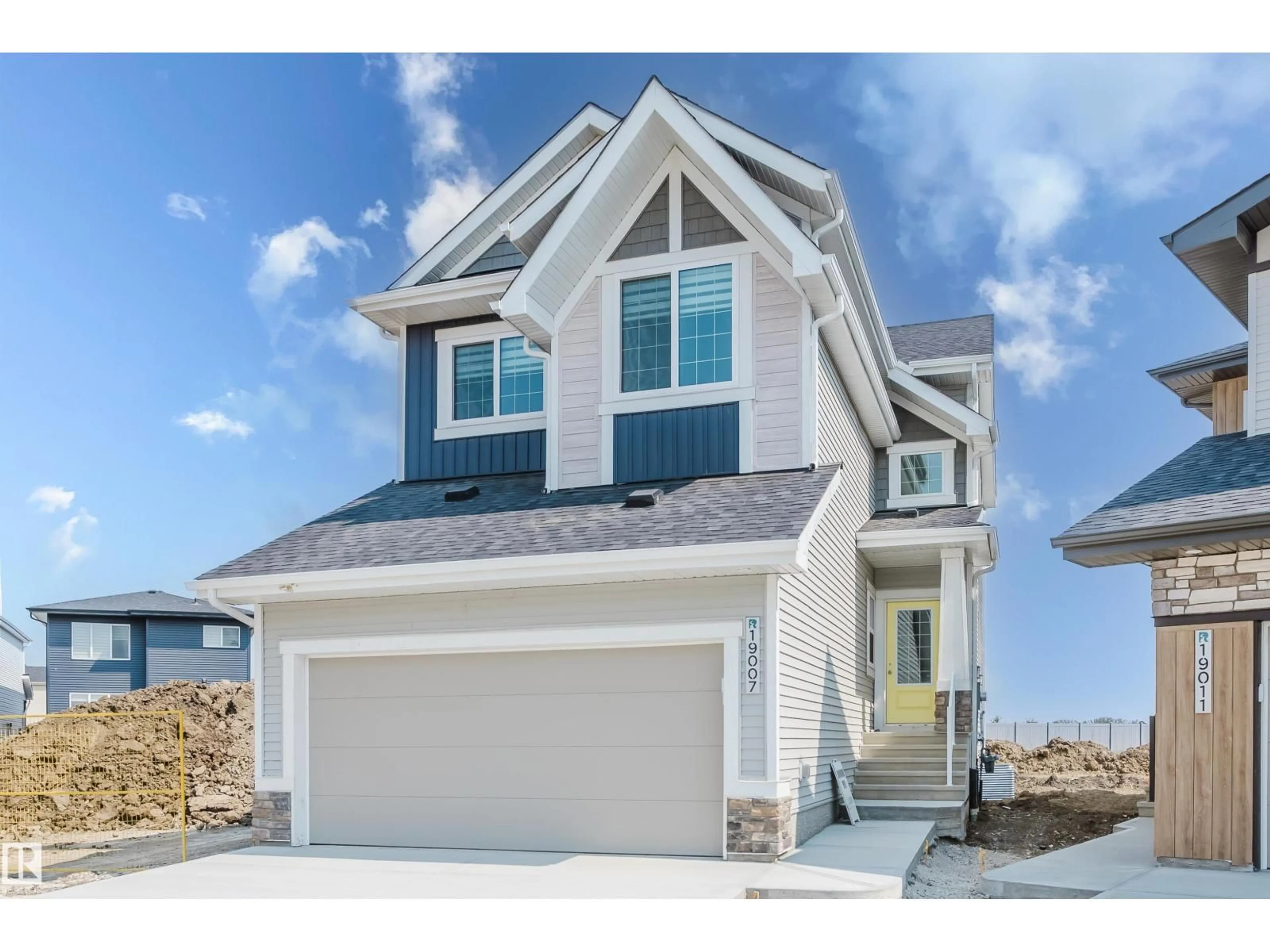 Home with vinyl exterior material, street for 19007 20 AV, Edmonton Alberta T6M3E8