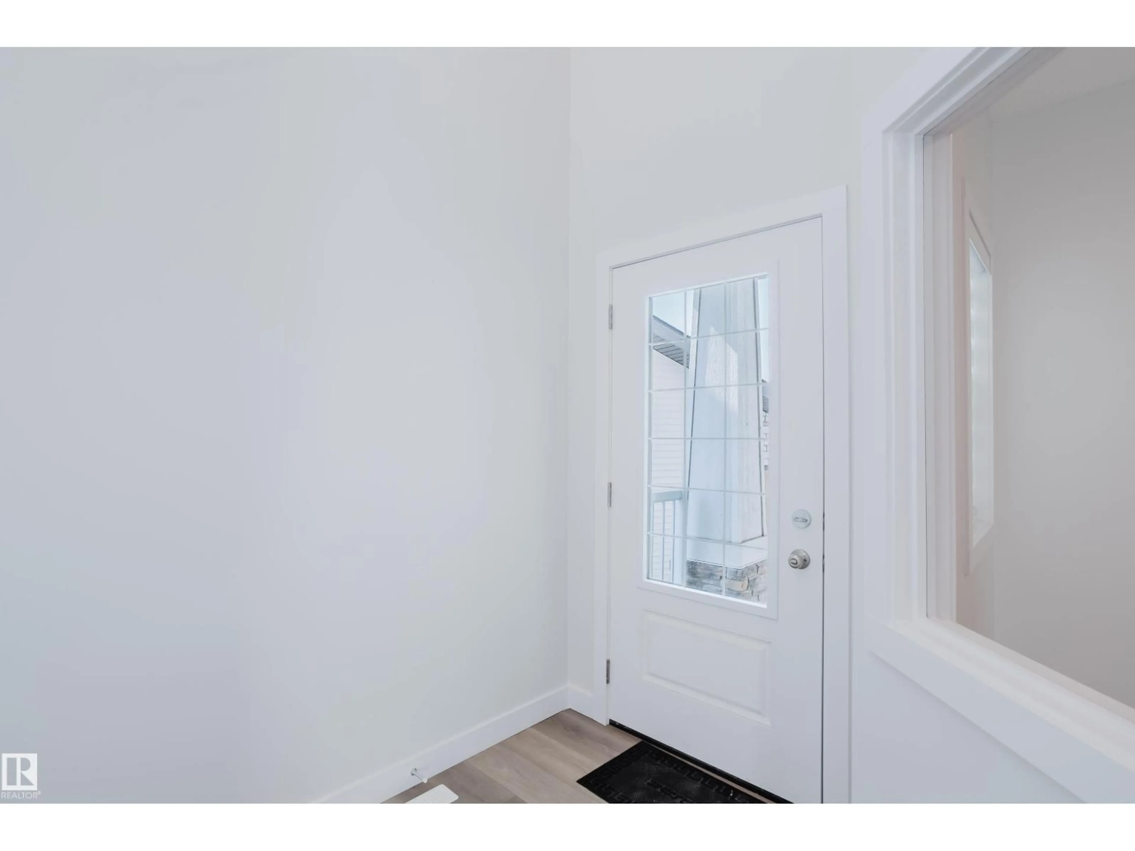 Indoor entryway for 19007 20 AV, Edmonton Alberta T6M3E8