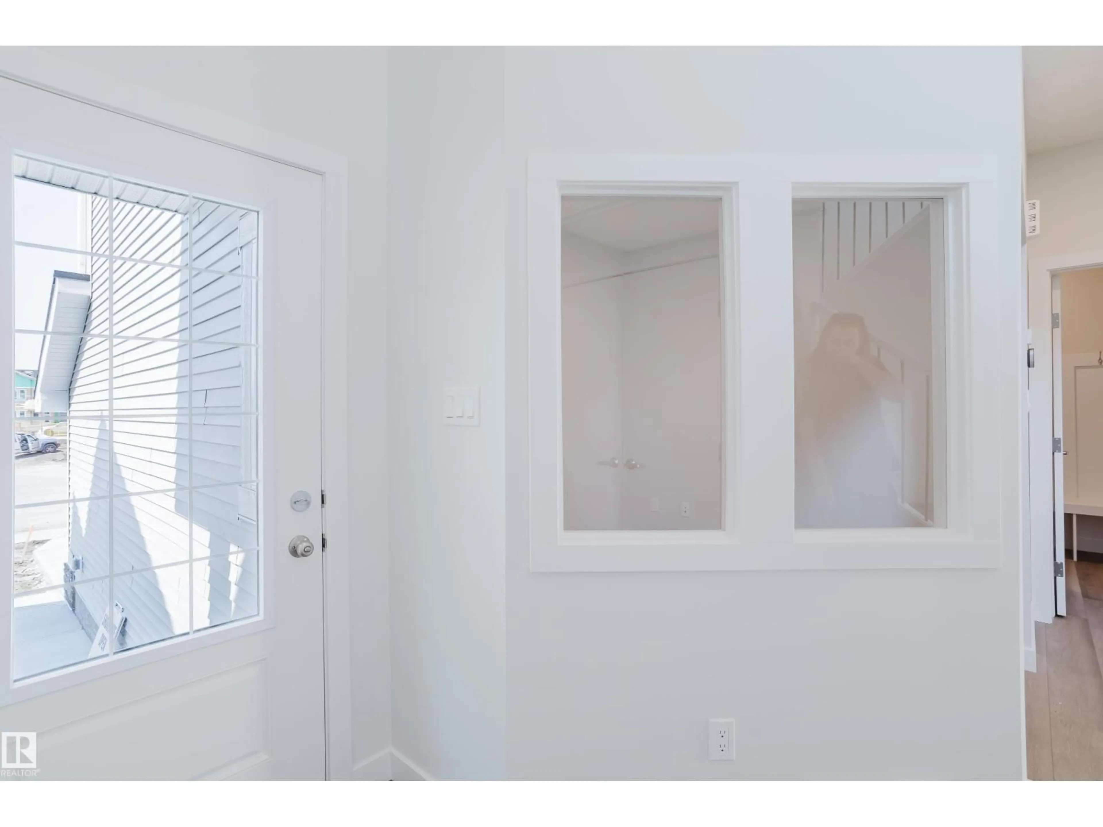 Indoor entryway for 19007 20 AV, Edmonton Alberta T6M3E8