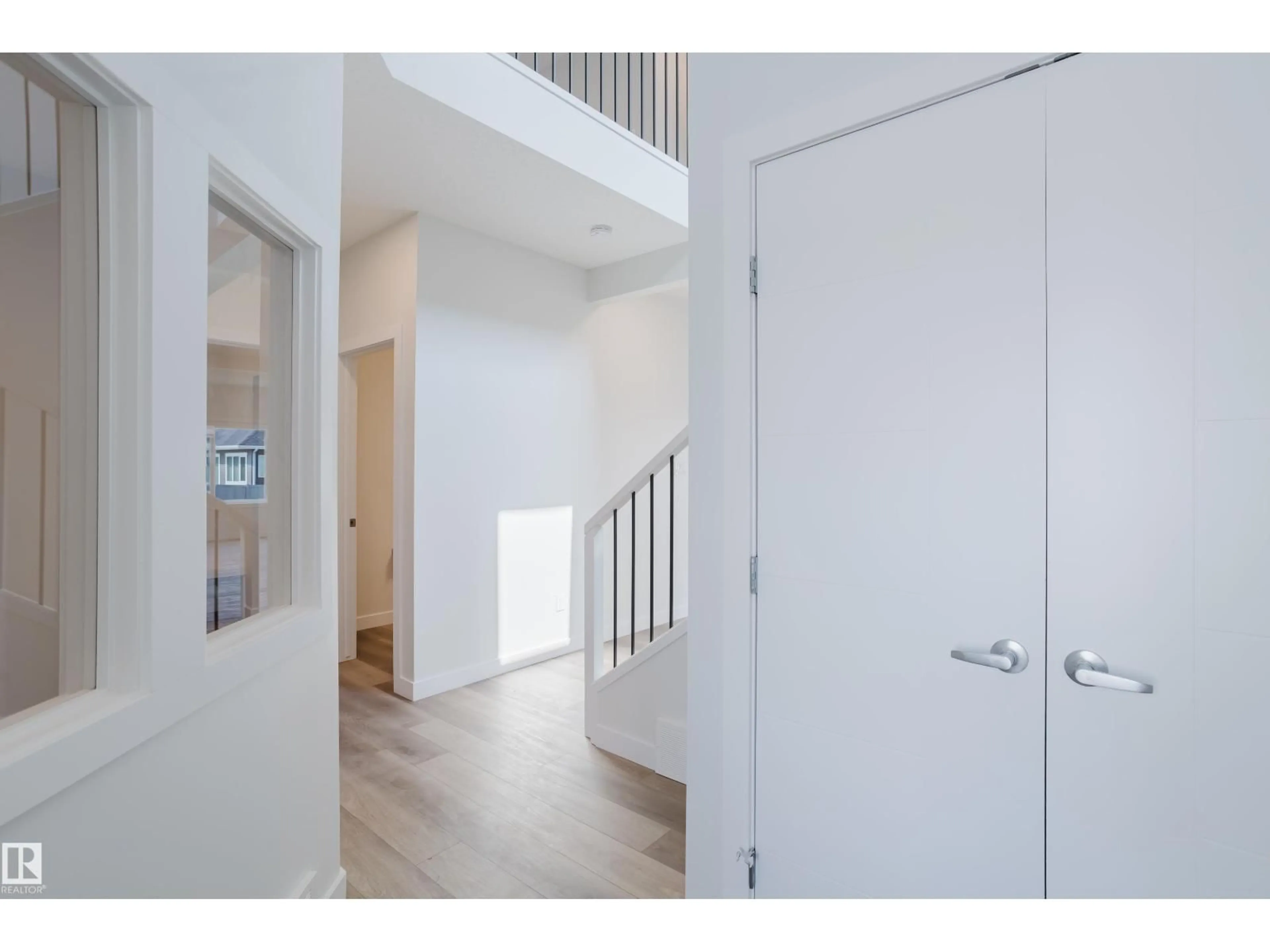 Indoor entryway for 19007 20 AV, Edmonton Alberta T6M3E8