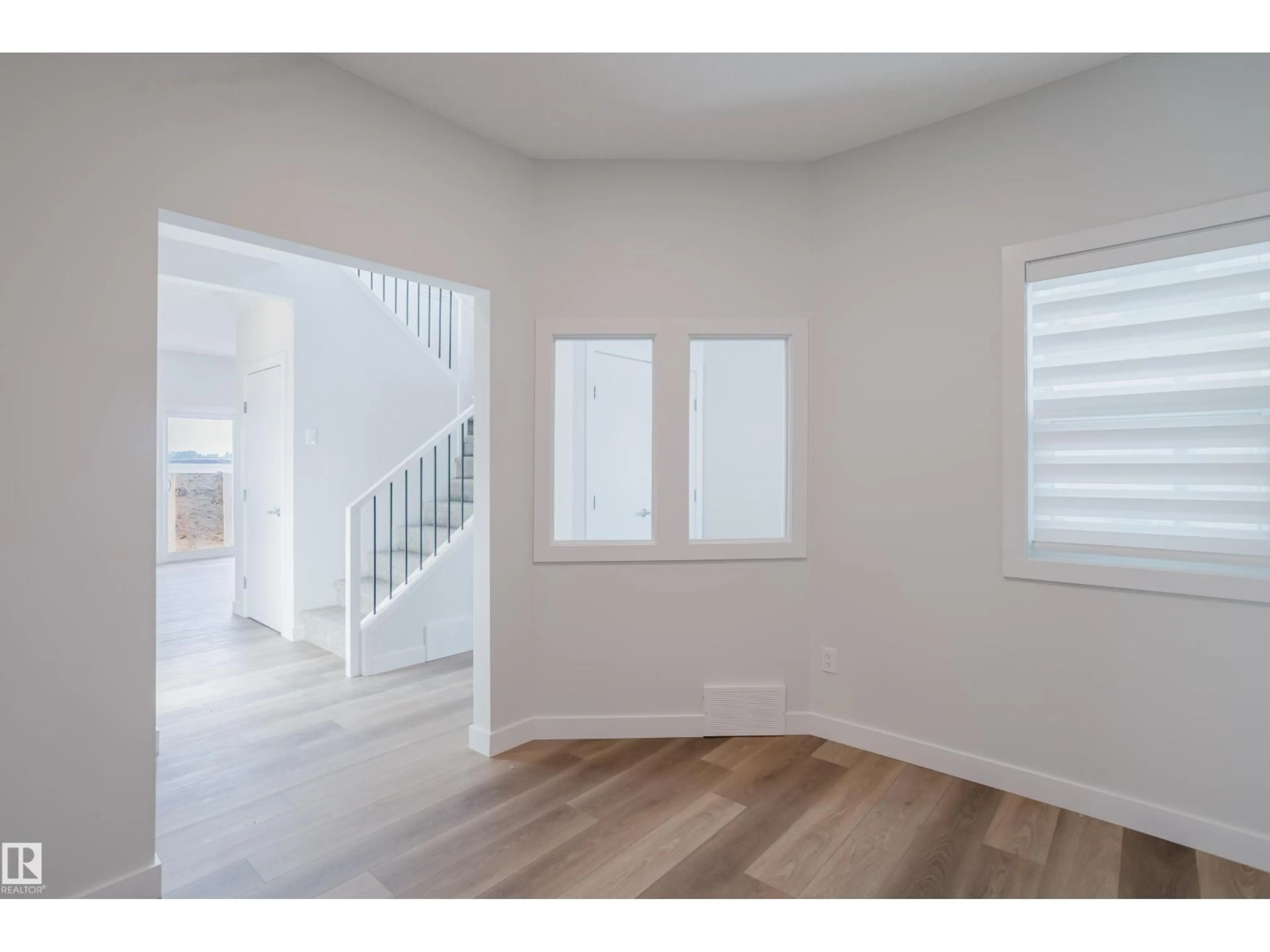 Indoor entryway for 19007 20 AV, Edmonton Alberta T6M3E8