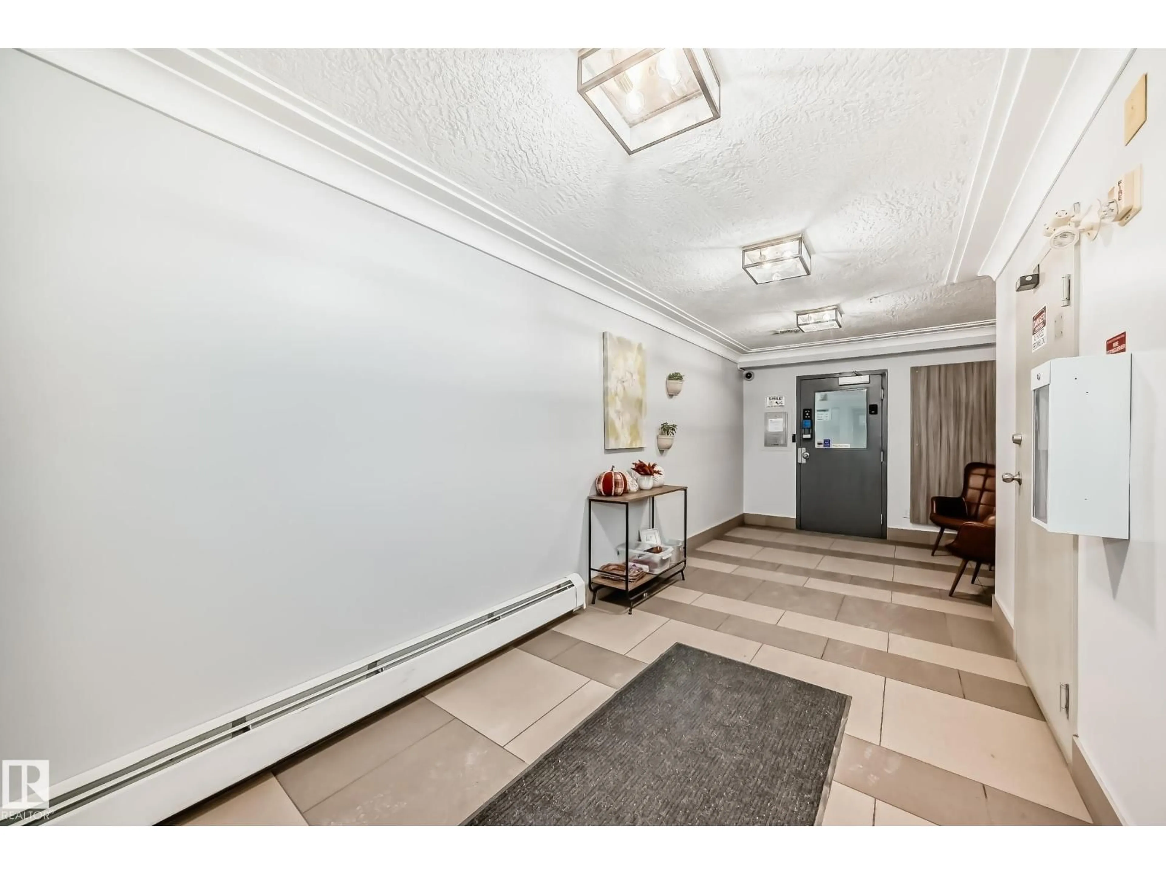 Indoor foyer for #301A - 260 SPRUCE RIDGE RD, Spruce Grove Alberta T7X0A3