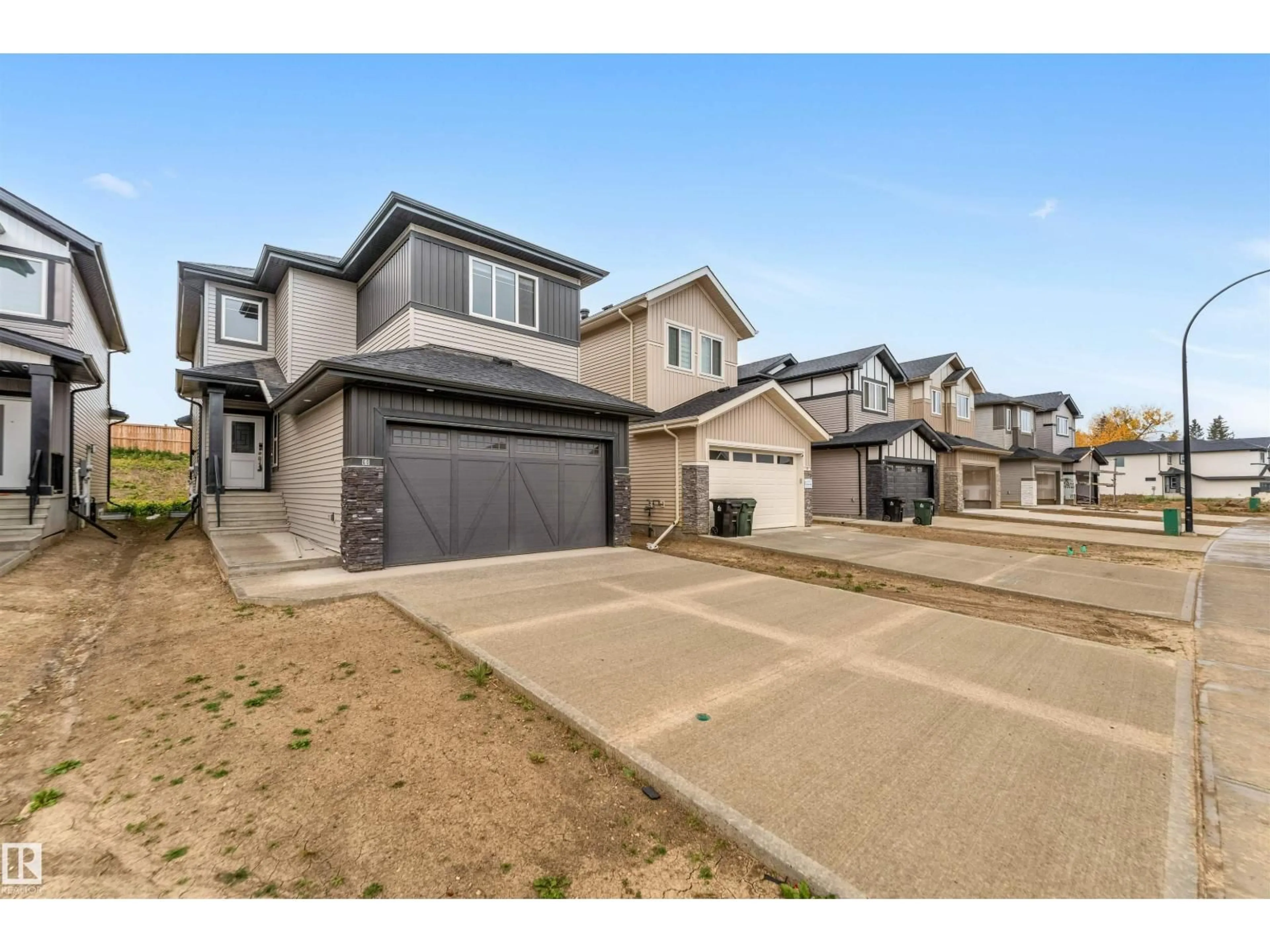A pic from outside/outdoor area/front of a property/back of a property/a pic from drone, street for 60 HEMINGWAY CR, Spruce Grove Alberta T7X2L6