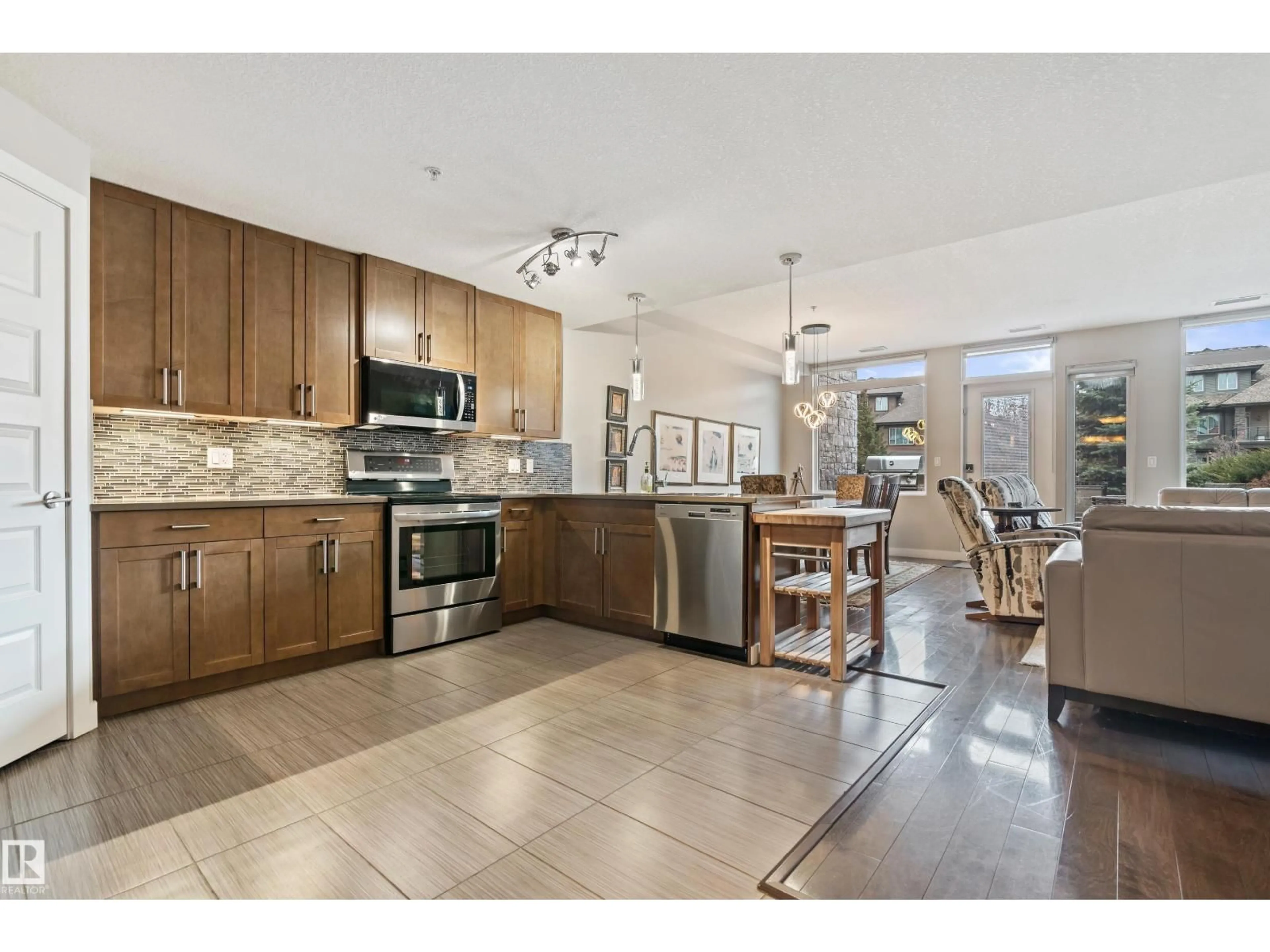 Open concept kitchen, ceramic/tile floor for #101 - 5151 WINDERMERE BV, Edmonton Alberta T6W2K4