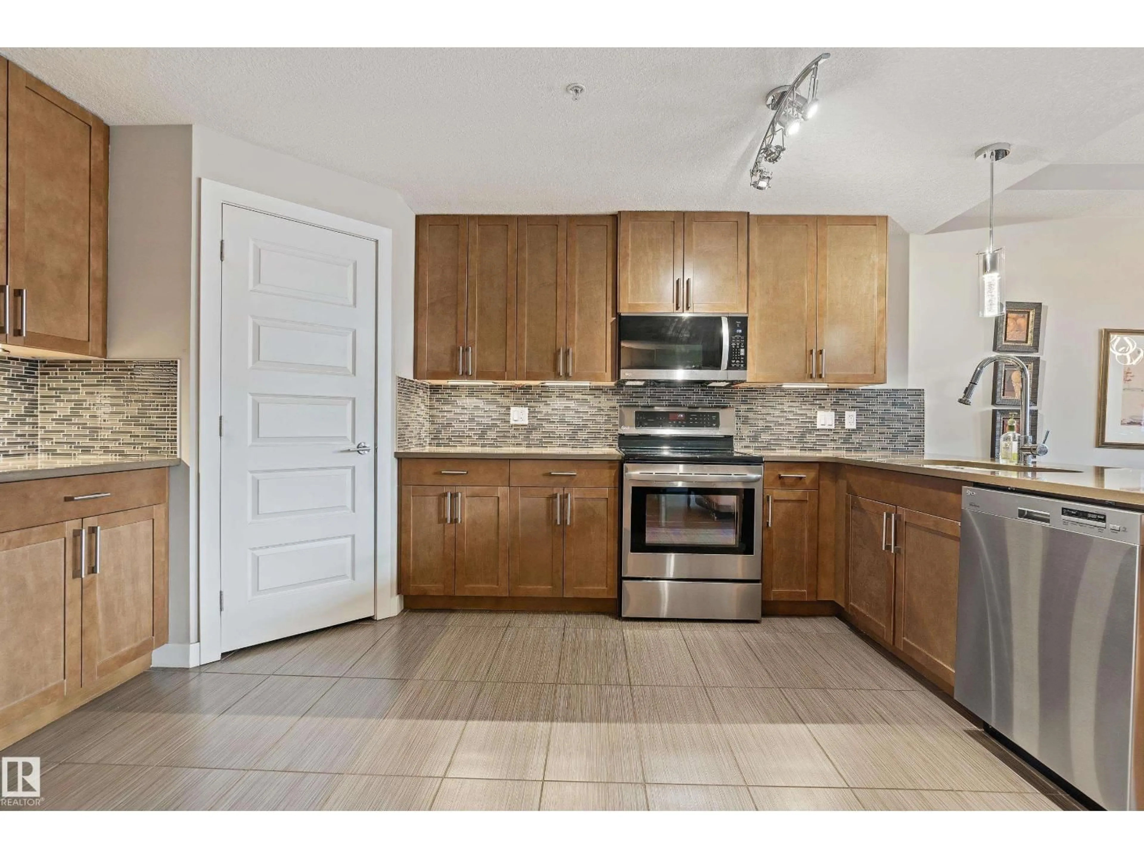 Standard kitchen, ceramic/tile floor for #101 - 5151 WINDERMERE BV, Edmonton Alberta T6W2K4