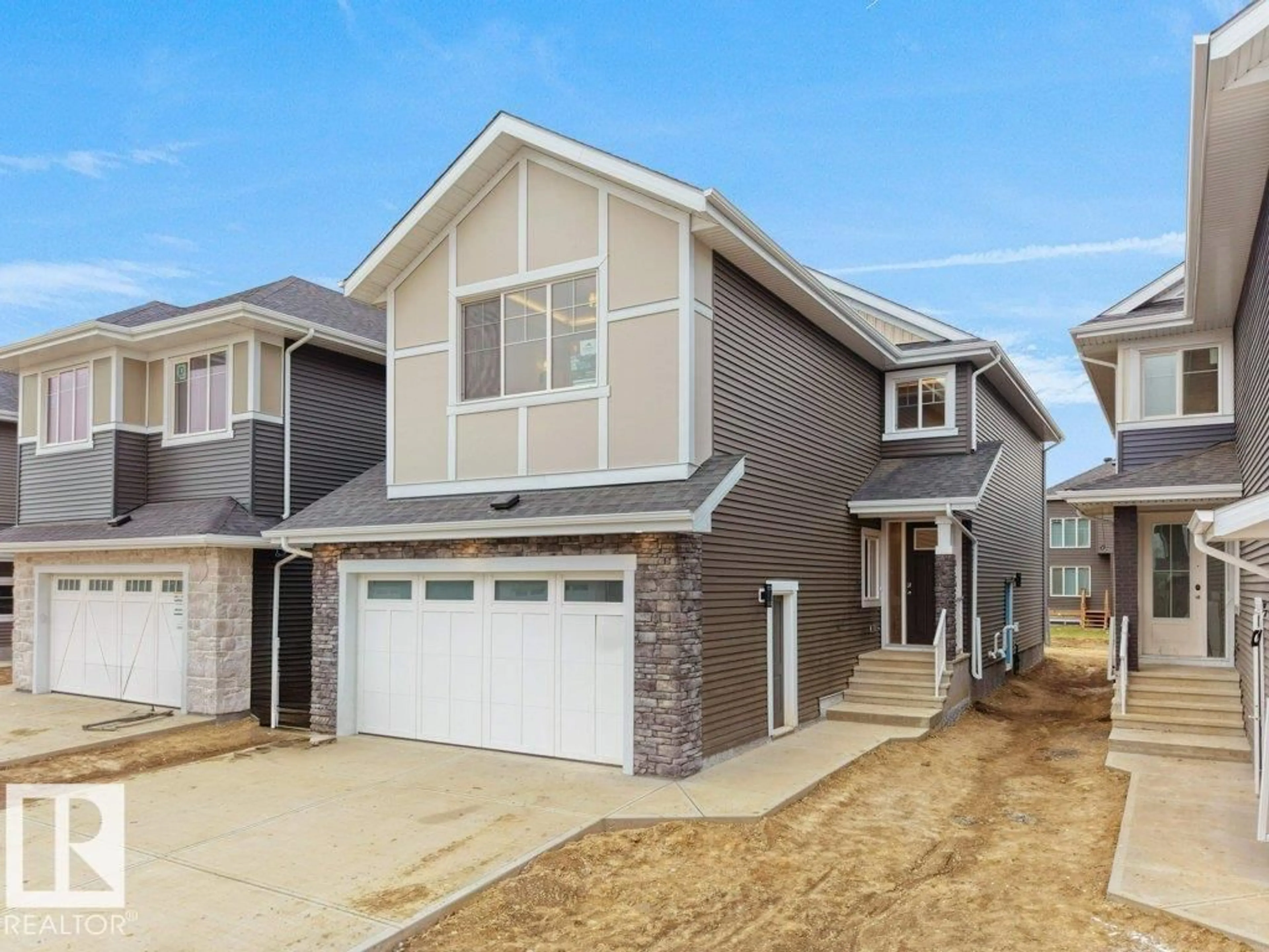 Home with vinyl exterior material, street for 3326 CHICKADEE DR, Edmonton Alberta T5S0V6