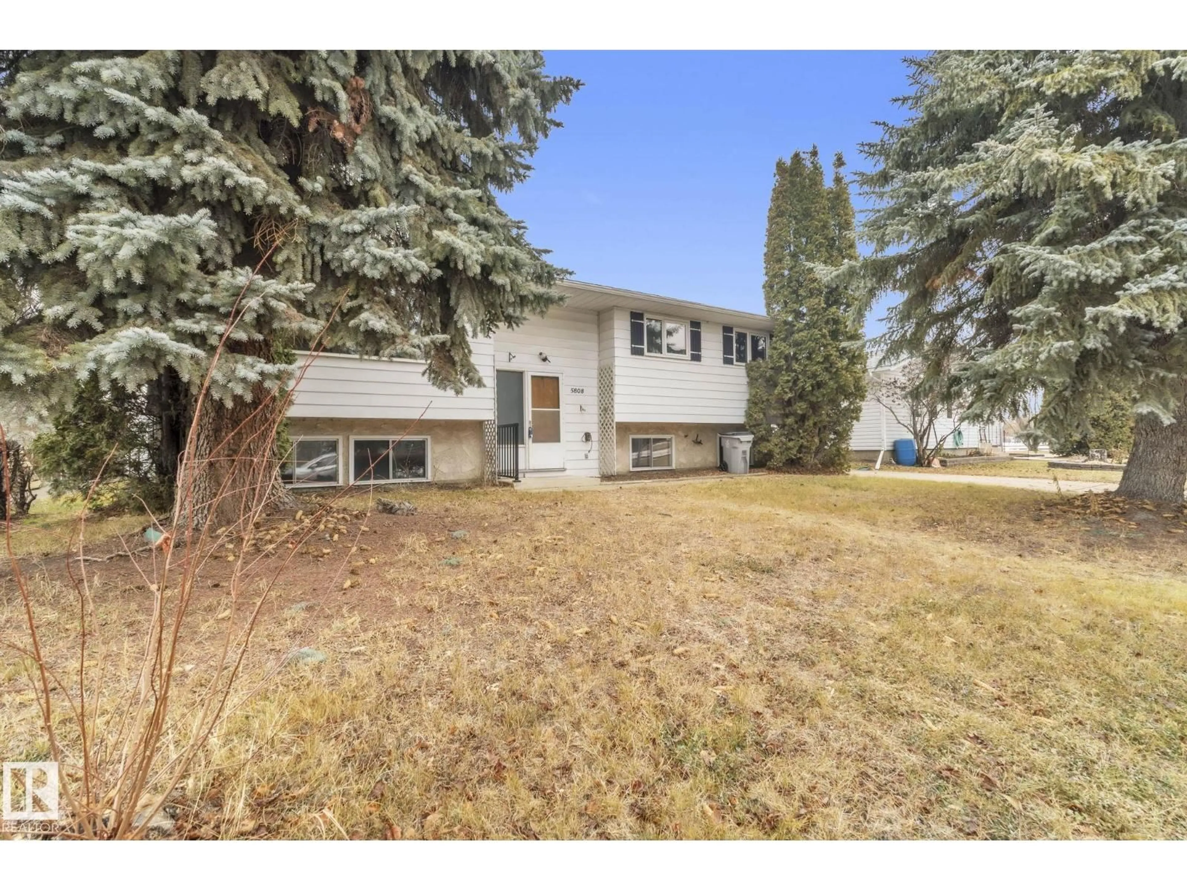 Home with vinyl exterior material, street for 5808 49 AV, Redwater Alberta T0A2W0