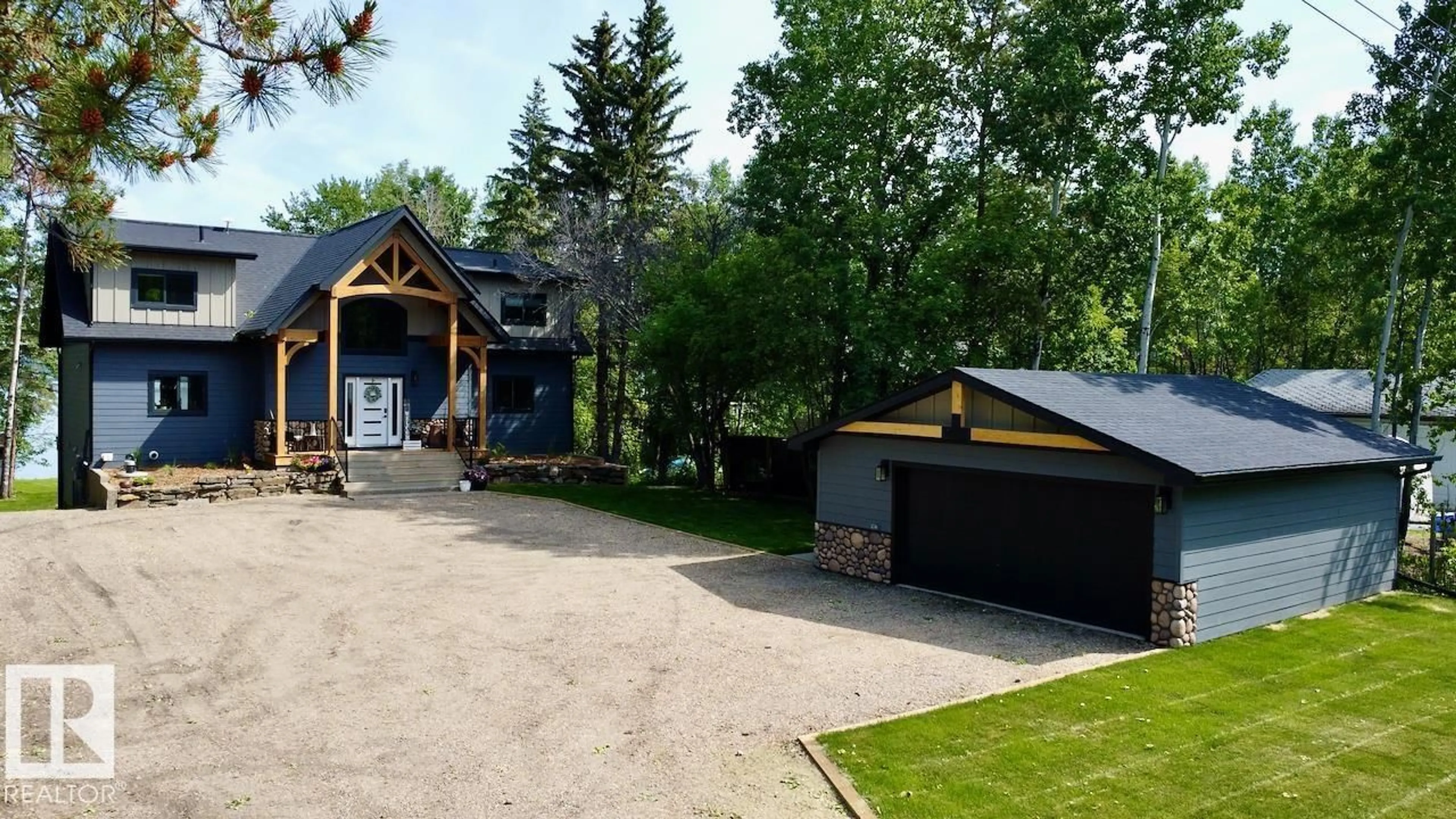 A pic from outside/outdoor area/front of a property/back of a property/a pic from drone, unknown for 52518 - 48 RGE ROAD 52, Rural Parkland County Alberta T0E2B0