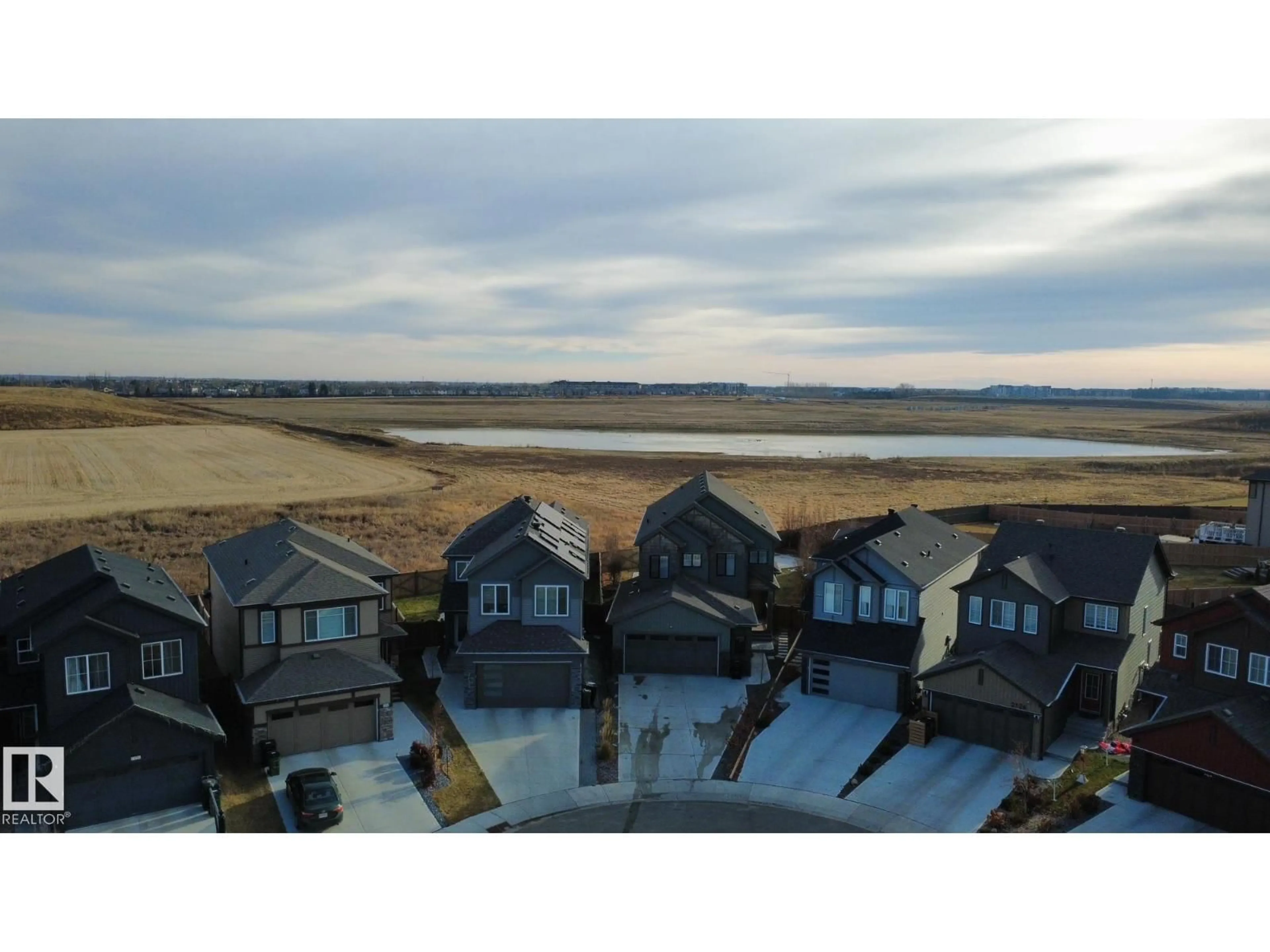 A pic from outside/outdoor area/front of a property/back of a property/a pic from drone, water/lake/river/ocean view for 2130 GRAYDON HILL CR, Edmonton Alberta T6W4K6