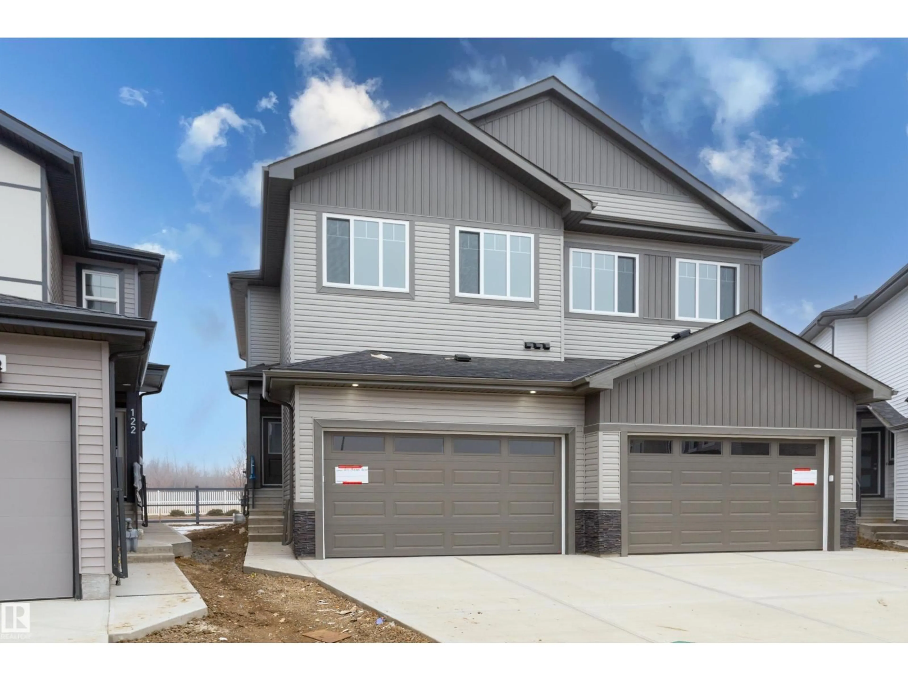 Home with vinyl exterior material, street for 124 MITCHELL BN, Leduc Alberta T9E1T5