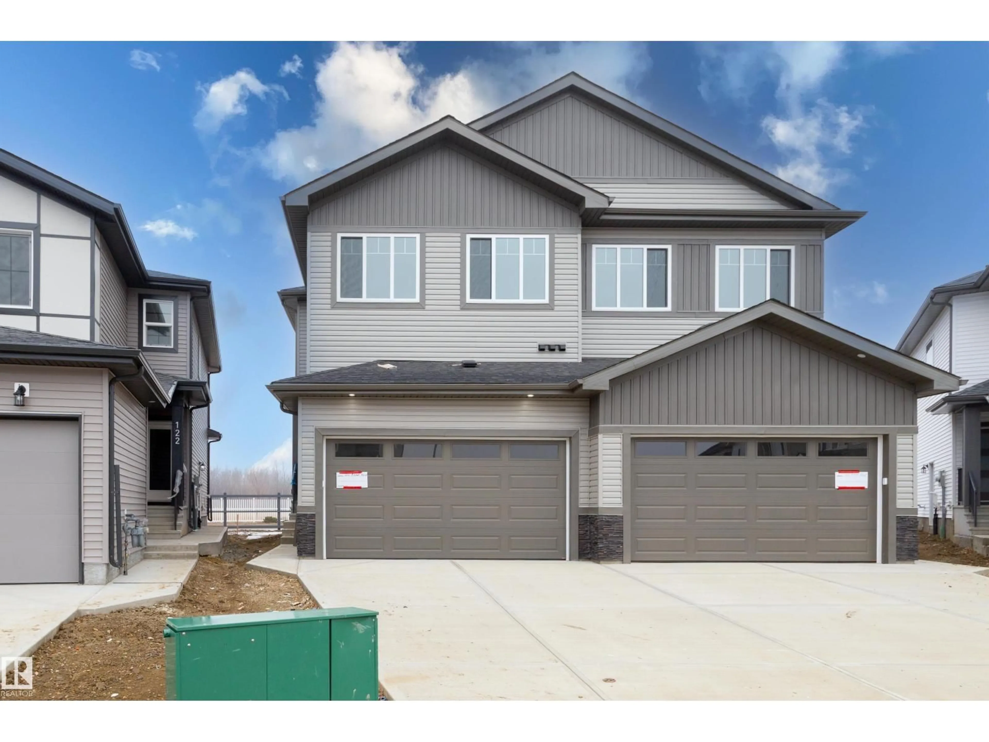 Home with vinyl exterior material, street for 124 MITCHELL BN, Leduc Alberta T9E1T5