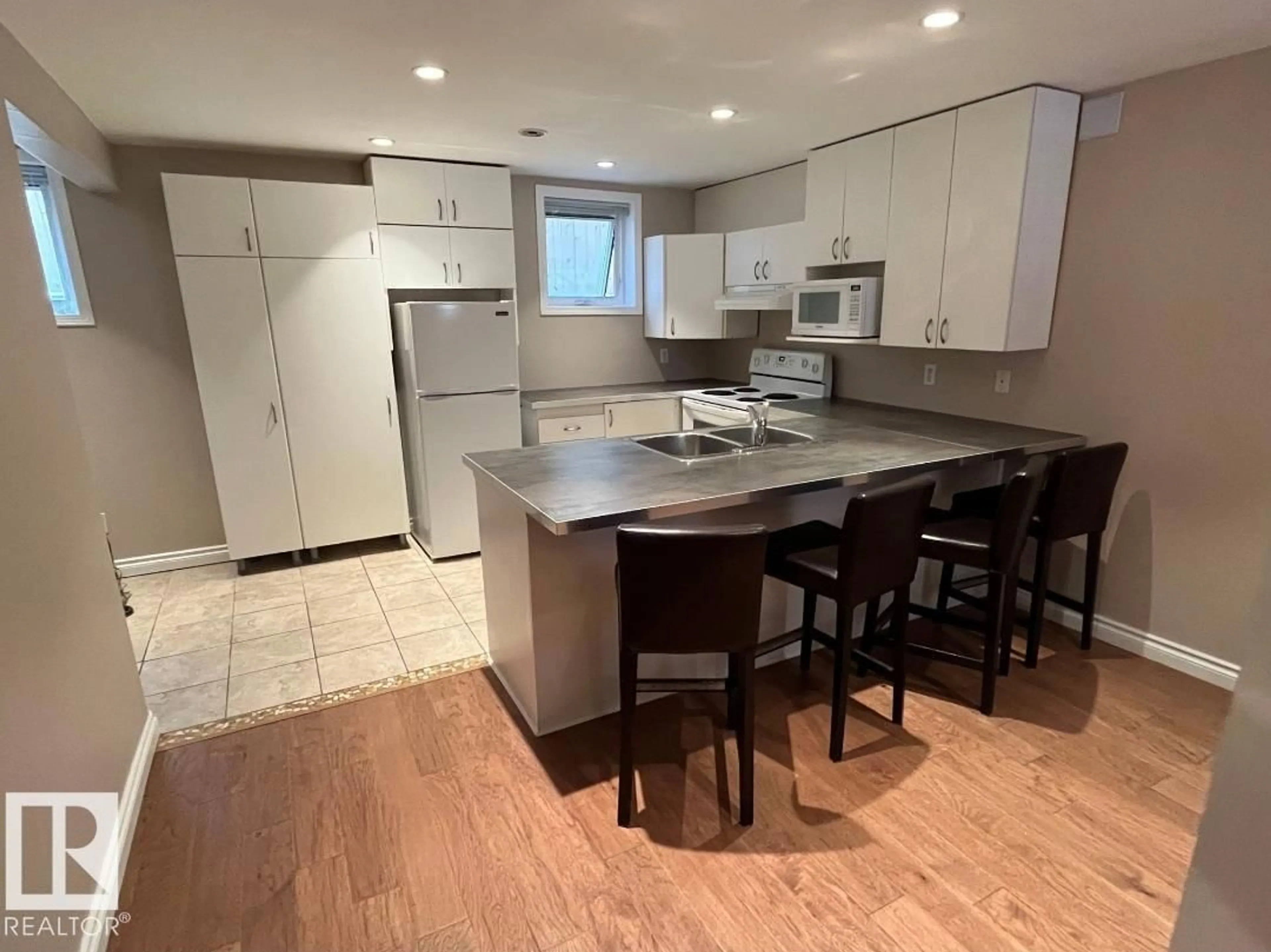 Open concept kitchen, unknown for NW - 9239 92 ST, Edmonton Alberta T6C3R4