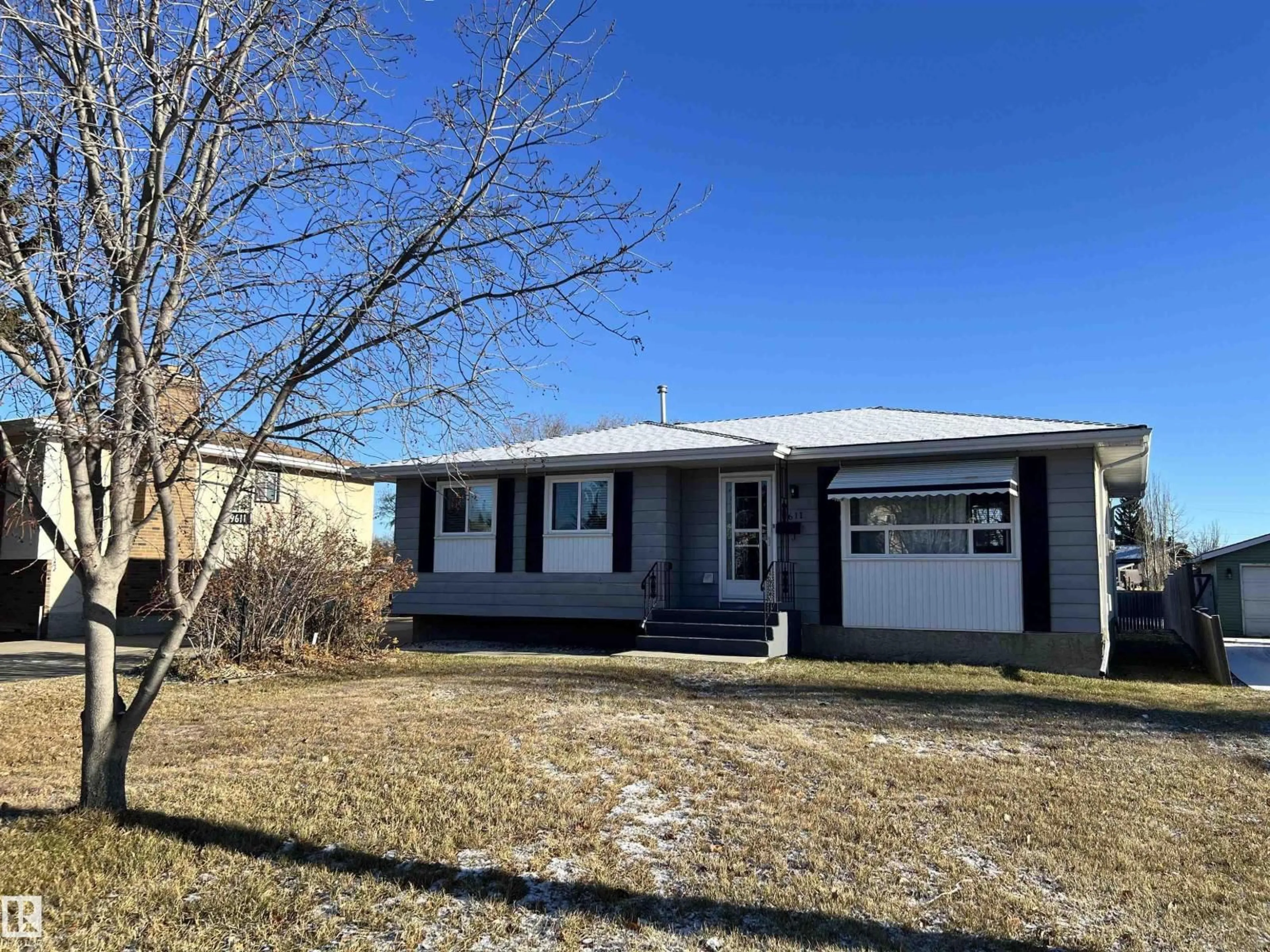 Home with vinyl exterior material, street for 9611 104 ST, Morinville Alberta T8R1C9