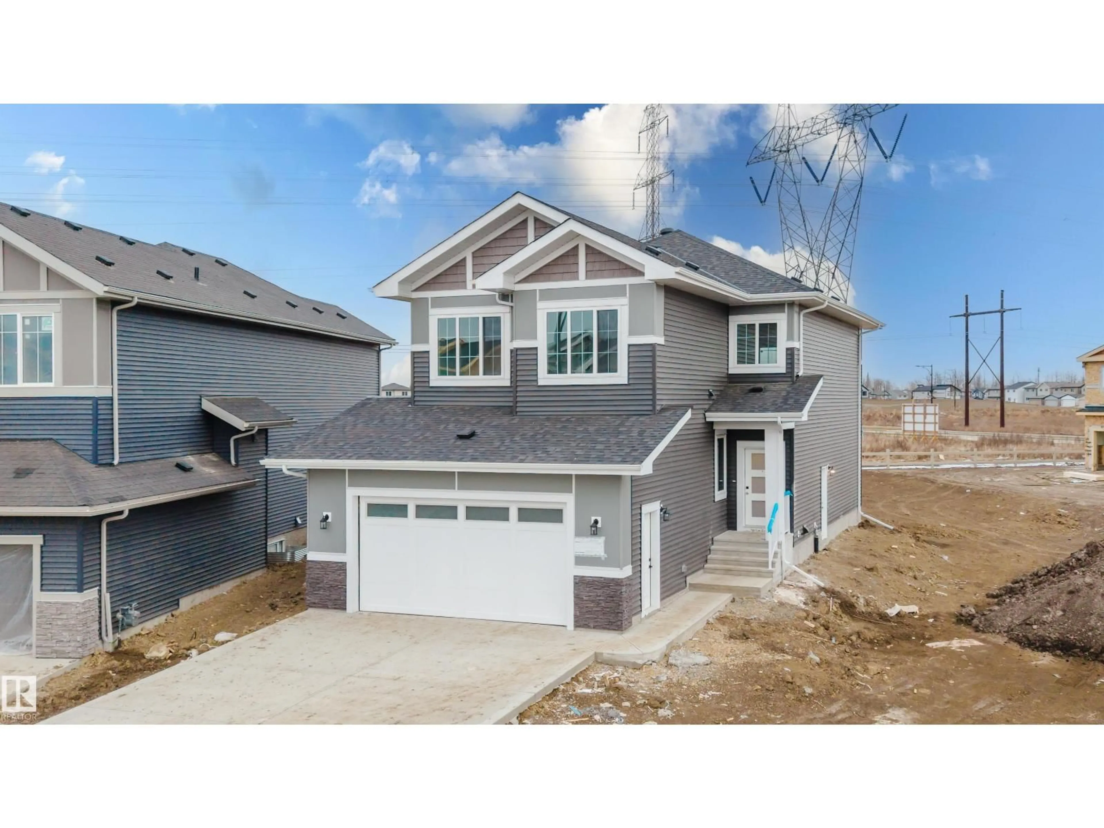 Home with vinyl exterior material, street for 811 ELDERBERRY CO, Edmonton Alberta T6M3J7