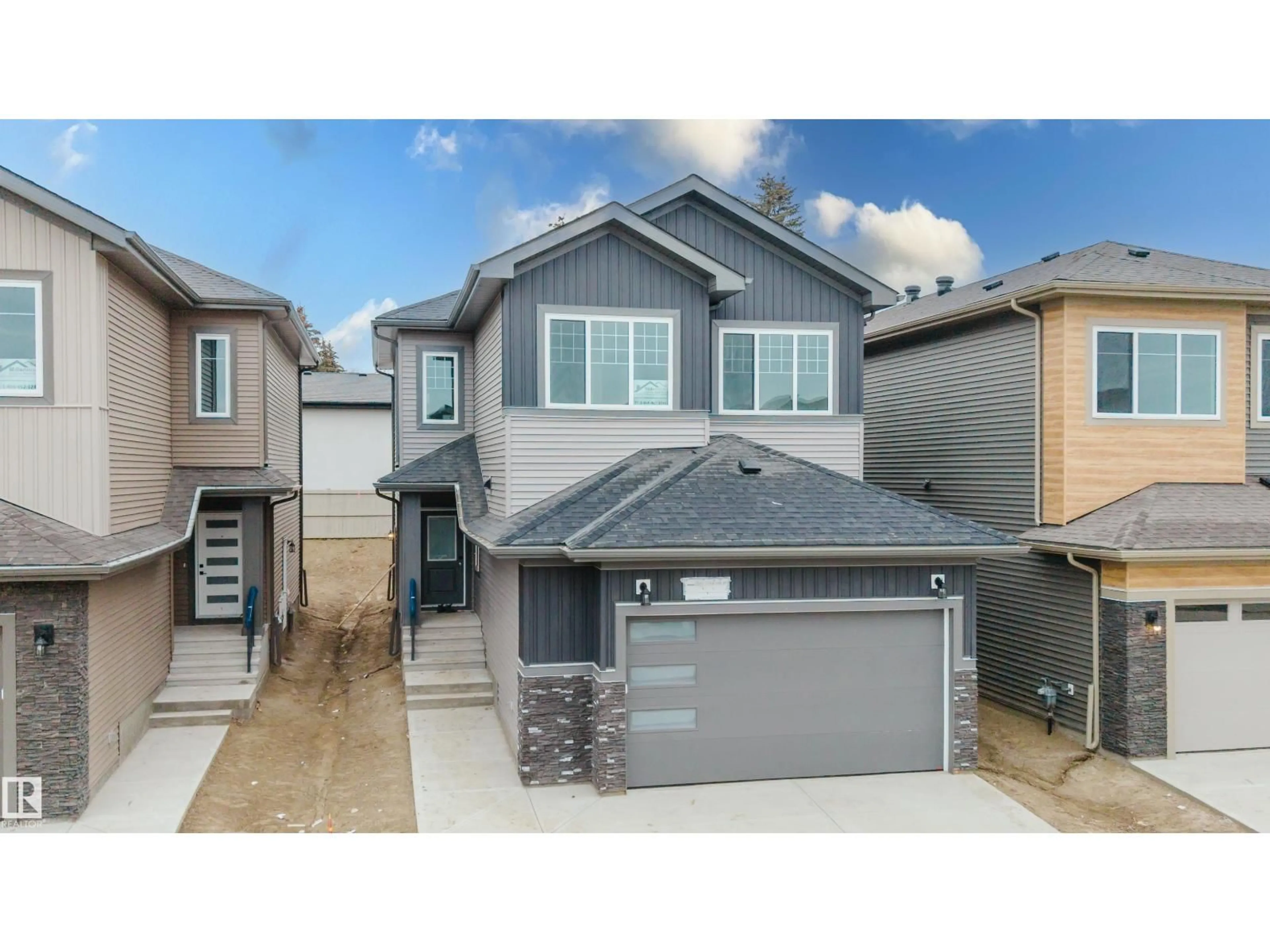 Home with vinyl exterior material, street for 1568 SISKIN LINK, Edmonton Alberta T5S0V1