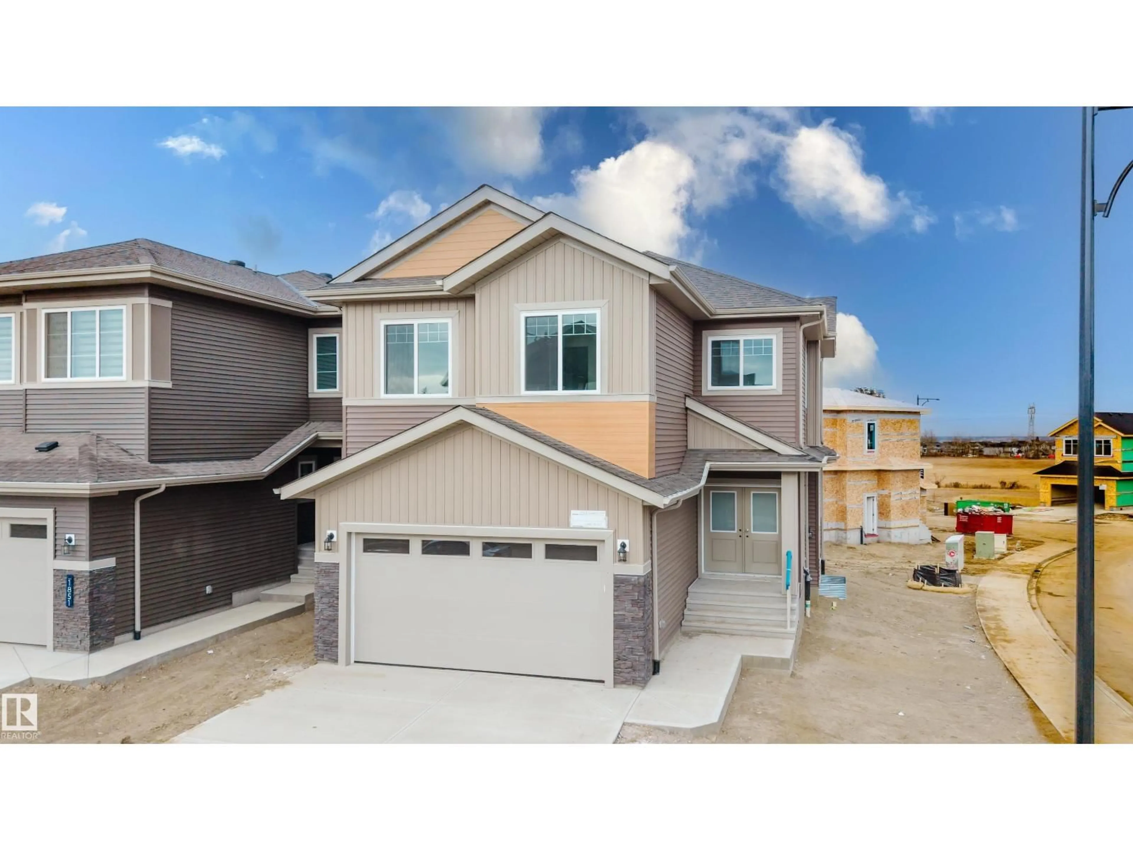 Home with vinyl exterior material, street for 1853 CROSSBILL LO, Edmonton Alberta T5S0W4