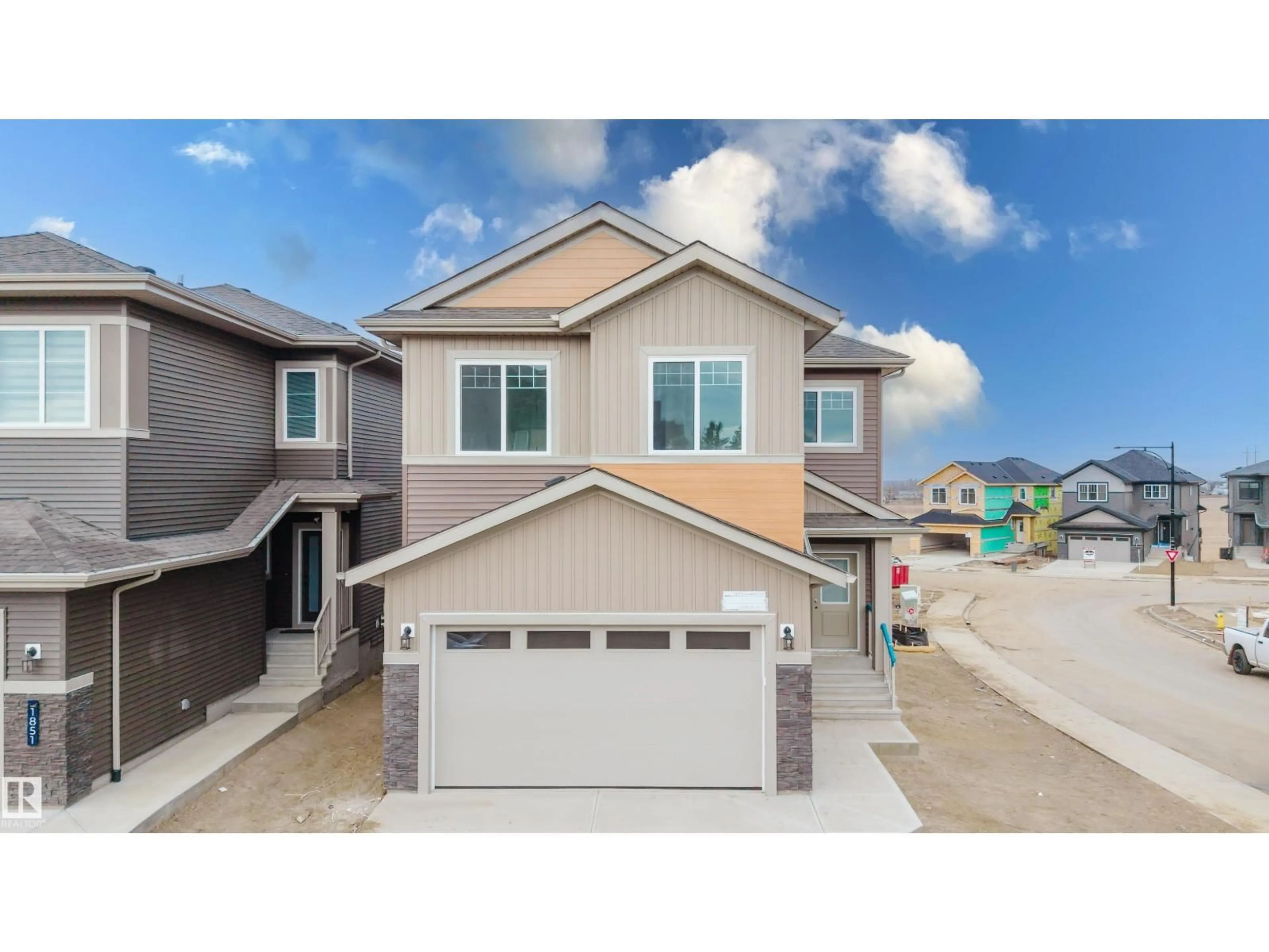 Home with vinyl exterior material, street for 1853 CROSSBILL LO, Edmonton Alberta T5S0W4