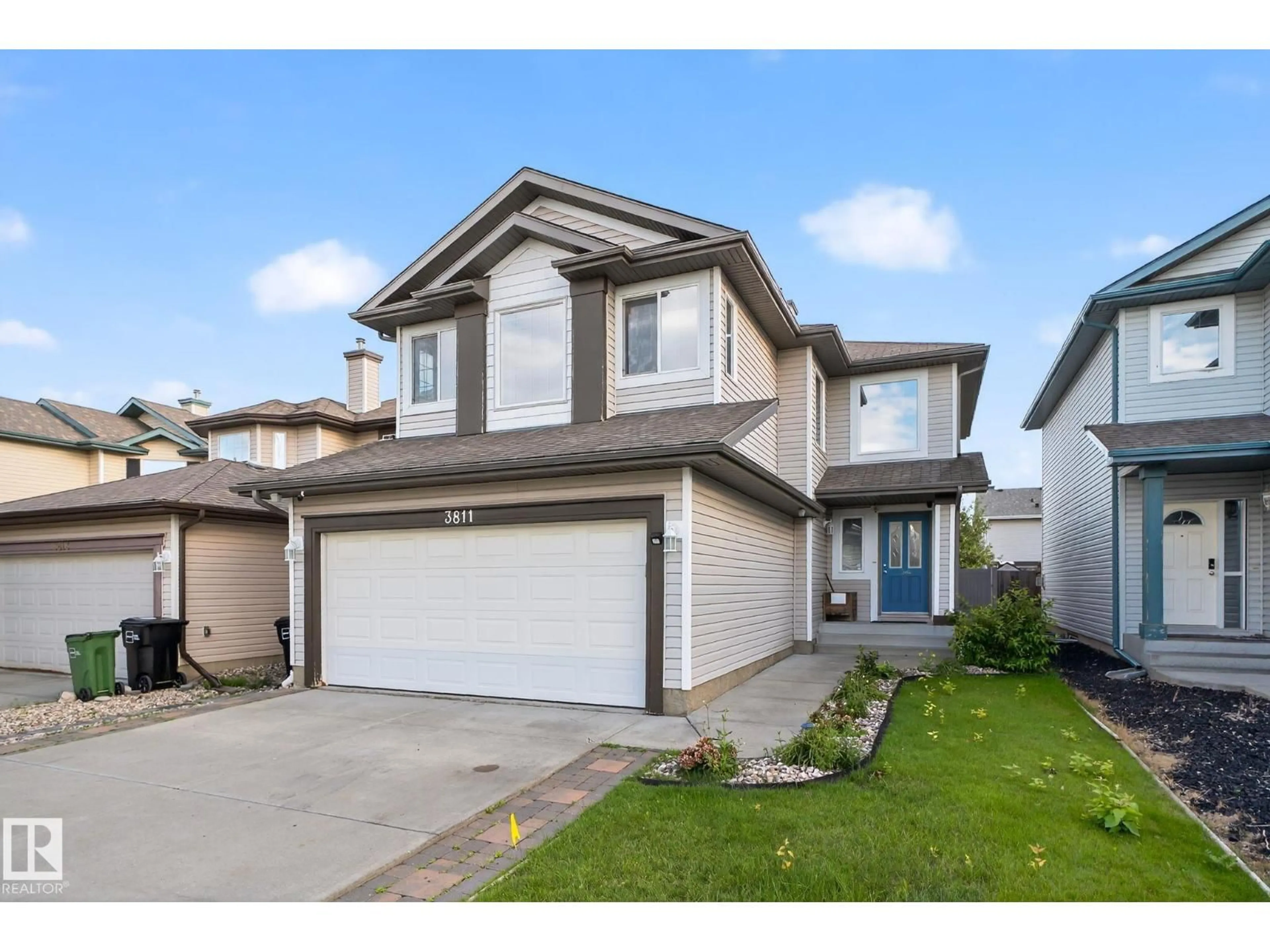 Home with vinyl exterior material, street for 3811 MCLEAN CL, Edmonton Alberta T6W1R4