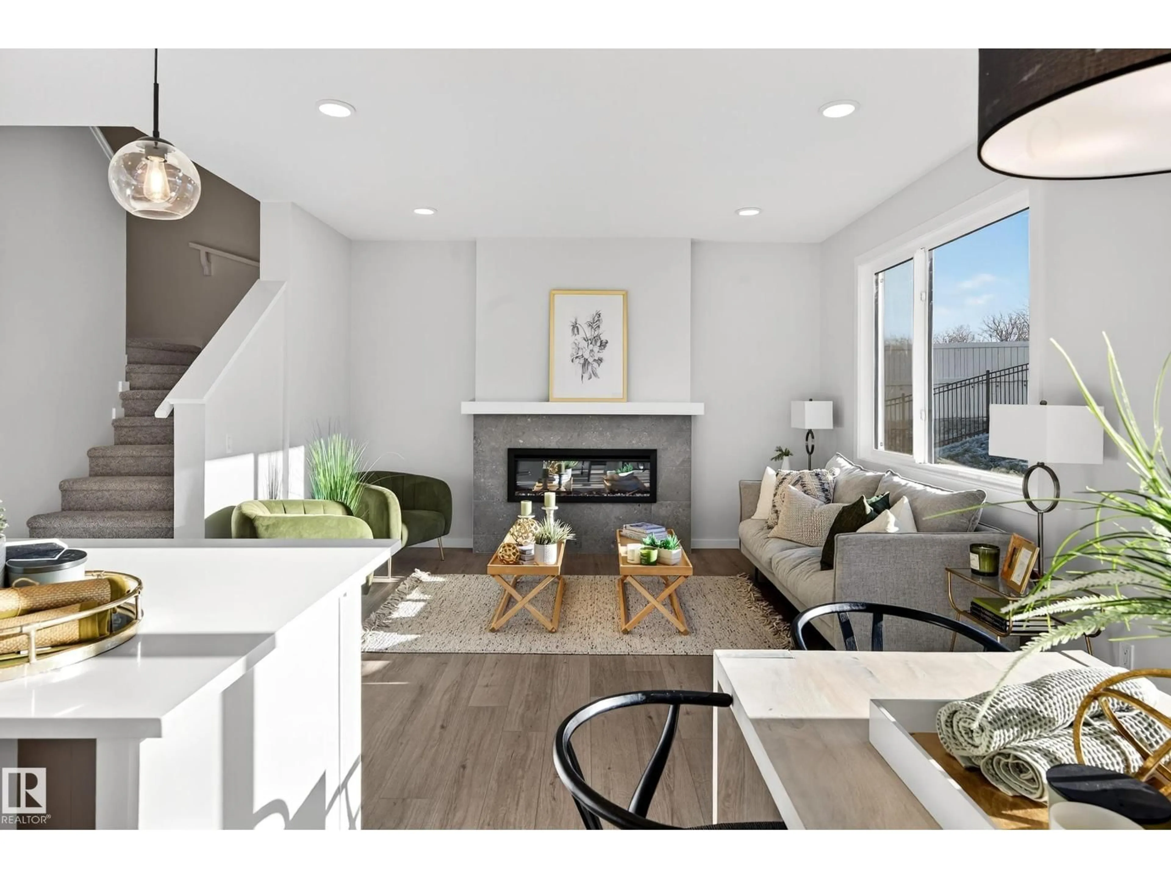 Open concept kitchen, wood/laminate floor for 105 STONEHOUSE WY, Leduc Alberta T9E1R1