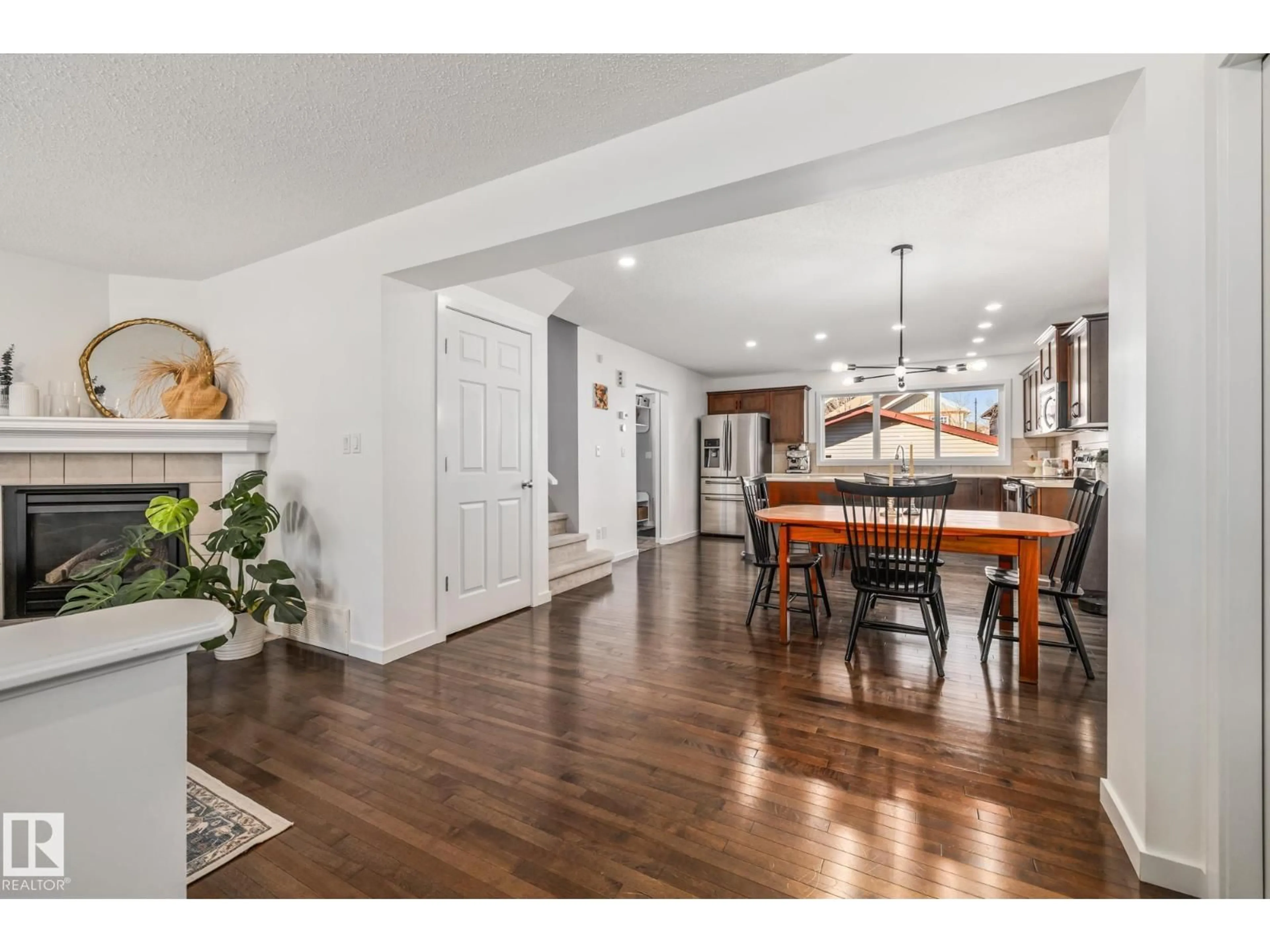 Open concept kitchen, wood/laminate floor for 2479 AUSTIN CR, Edmonton Alberta T6W0L4
