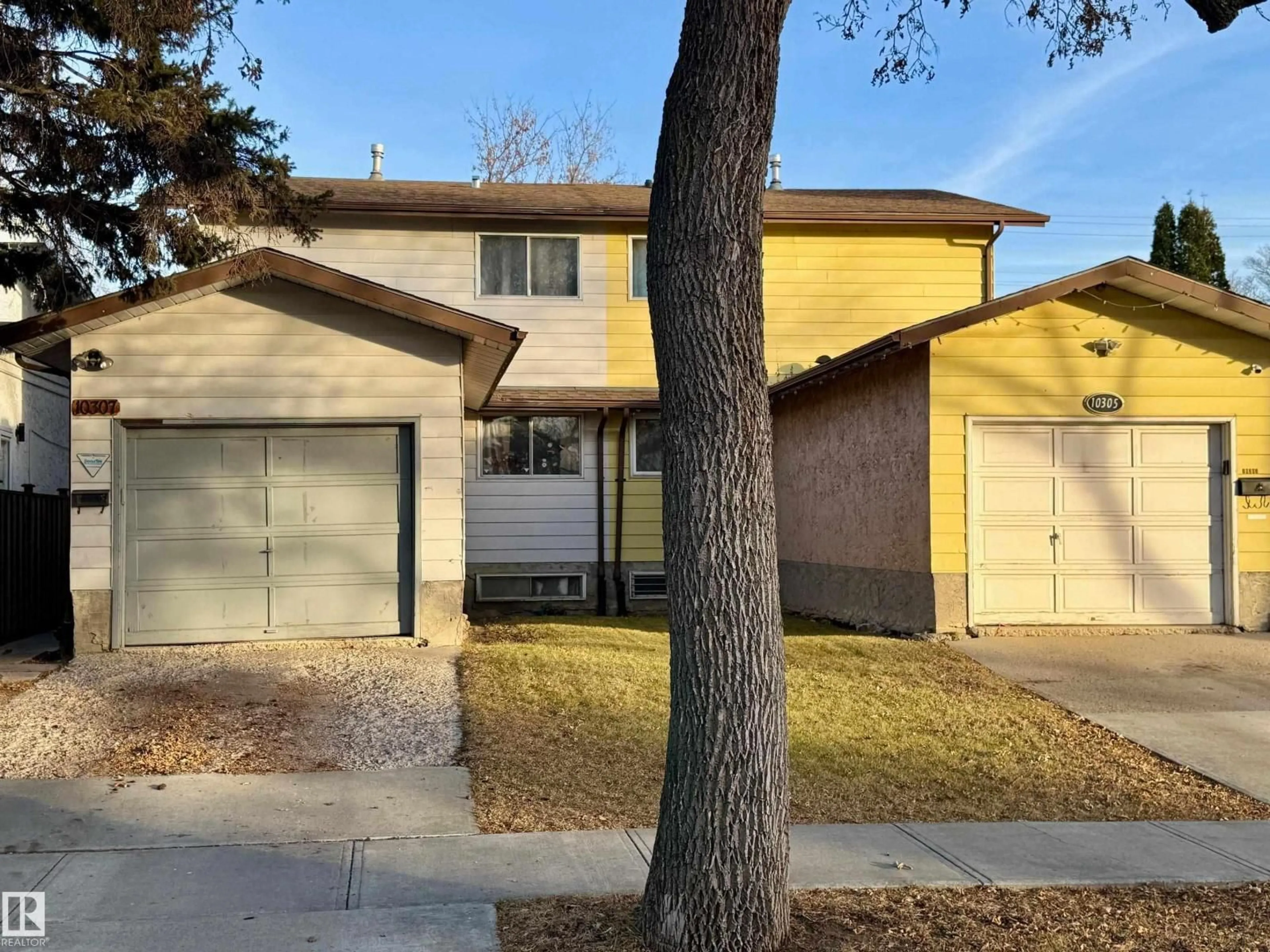 Home with vinyl exterior material, street for NW - 10307 150 ST, Edmonton Alberta T5P1P6