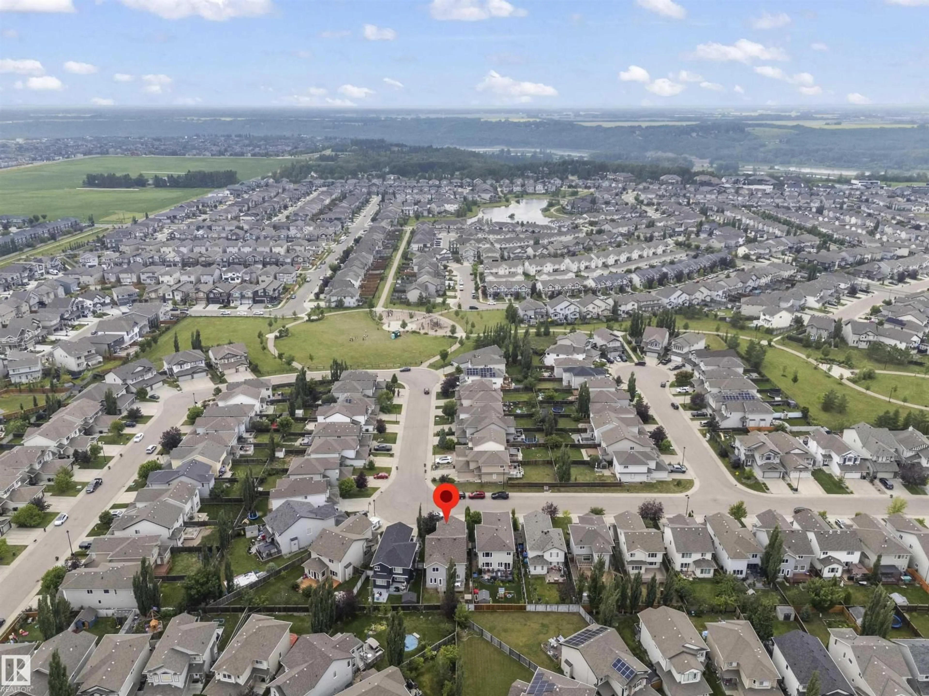 A pic from outside/outdoor area/front of a property/back of a property/a pic from drone, mountain view for NW - 753 173B ST, Edmonton Alberta T6W0M9