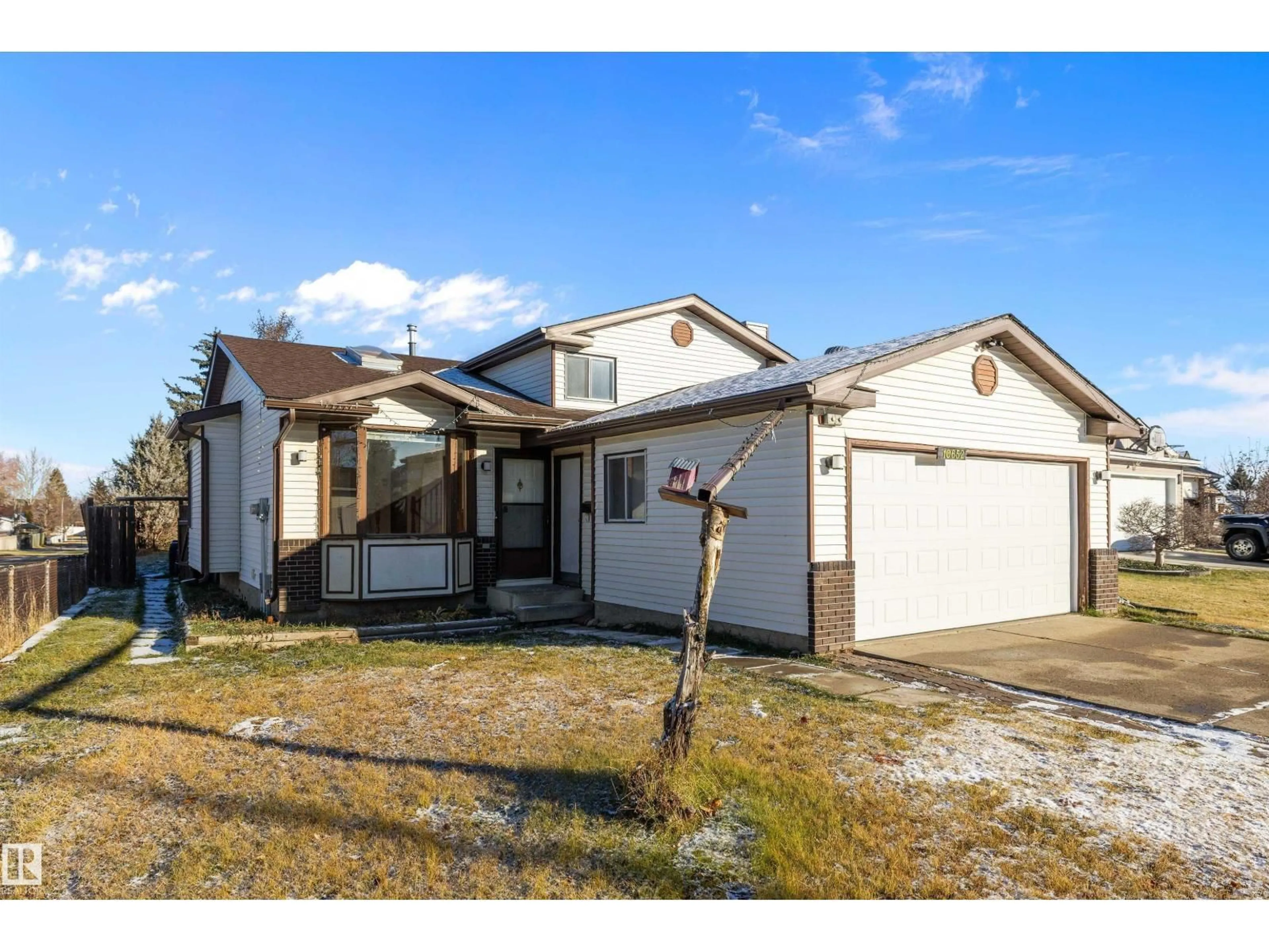 Home with vinyl exterior material, street for 10652 10 AV, Edmonton Alberta T6J6H1