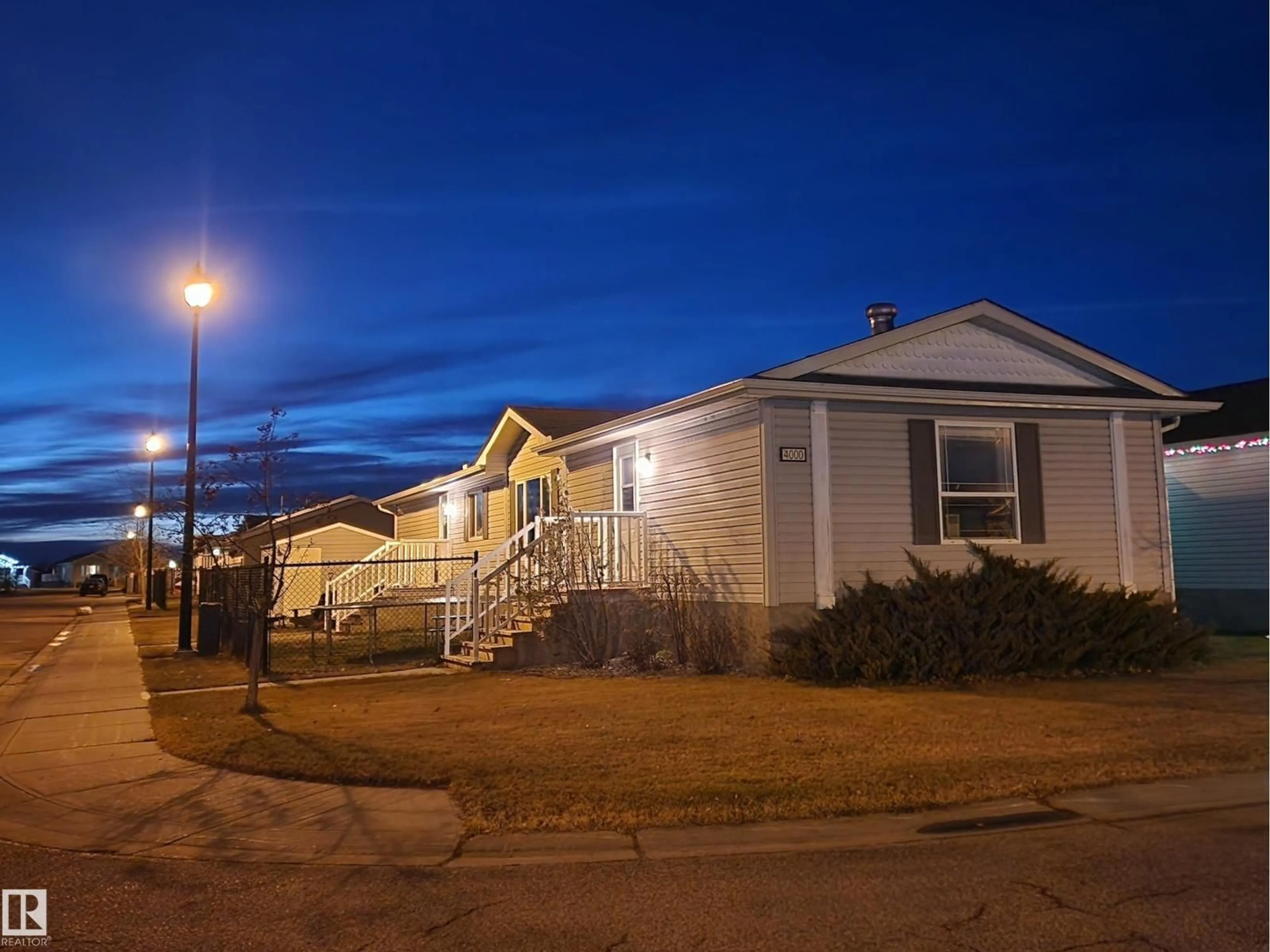 A pic from outside/outdoor area/front of a property/back of a property/a pic from drone, street for 4000 ASPEN WY, Leduc Alberta T9E8P9